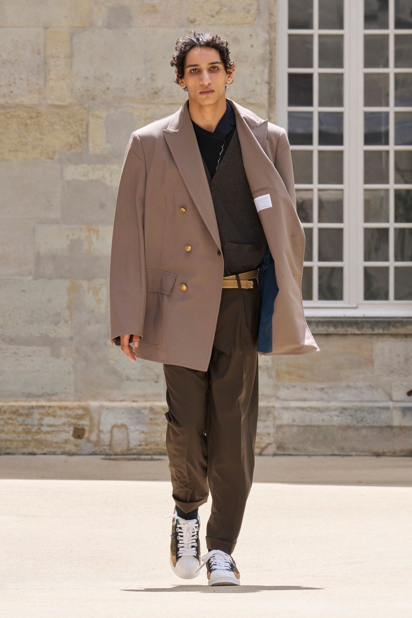 beige blazer gray sweater brown pants