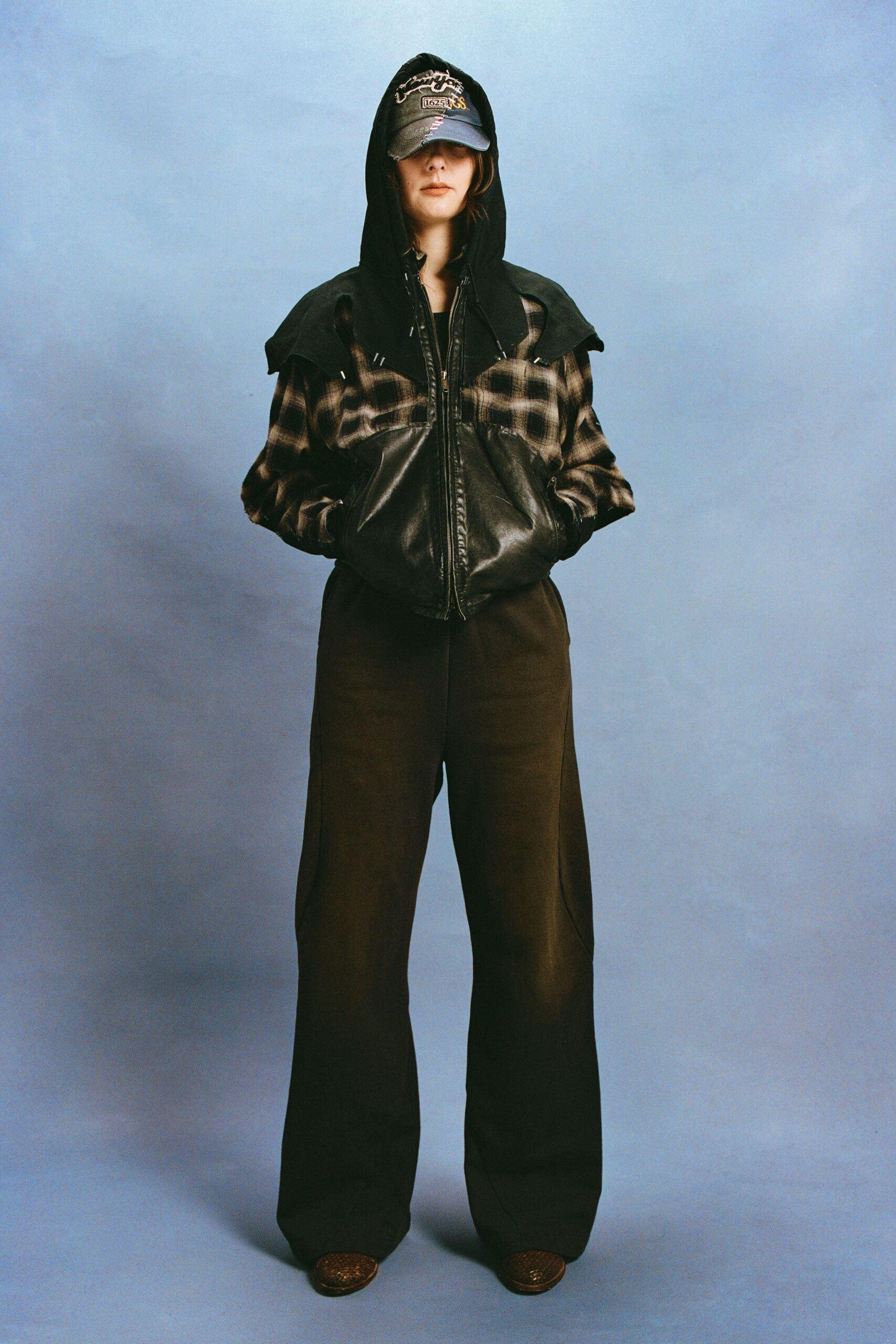 black leather jacket with wide-leg pants
