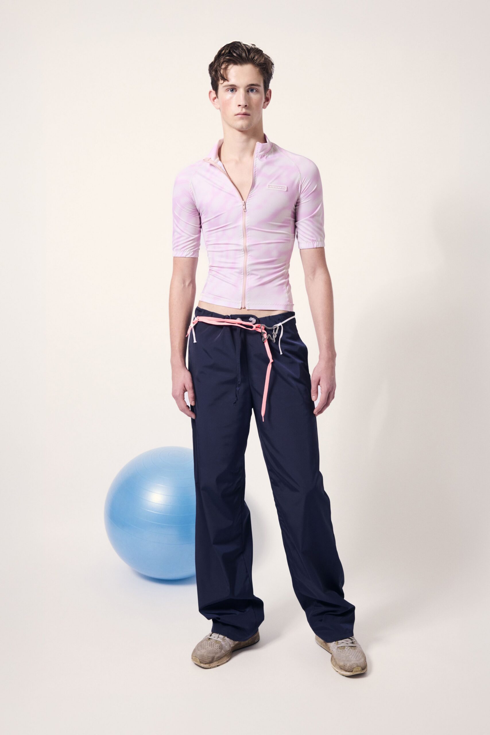 pink fitted top navy pants