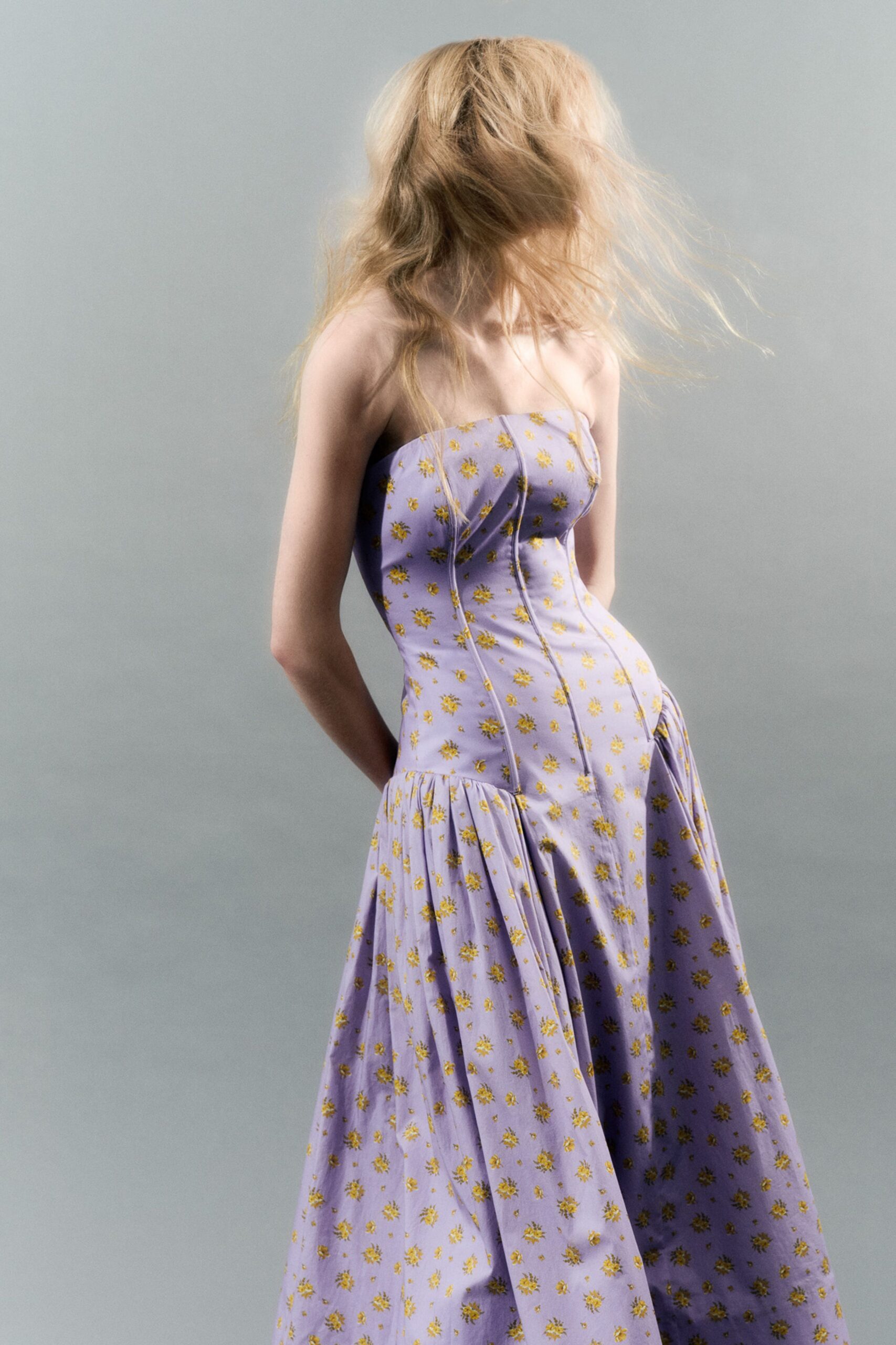purple strapless pleated gown