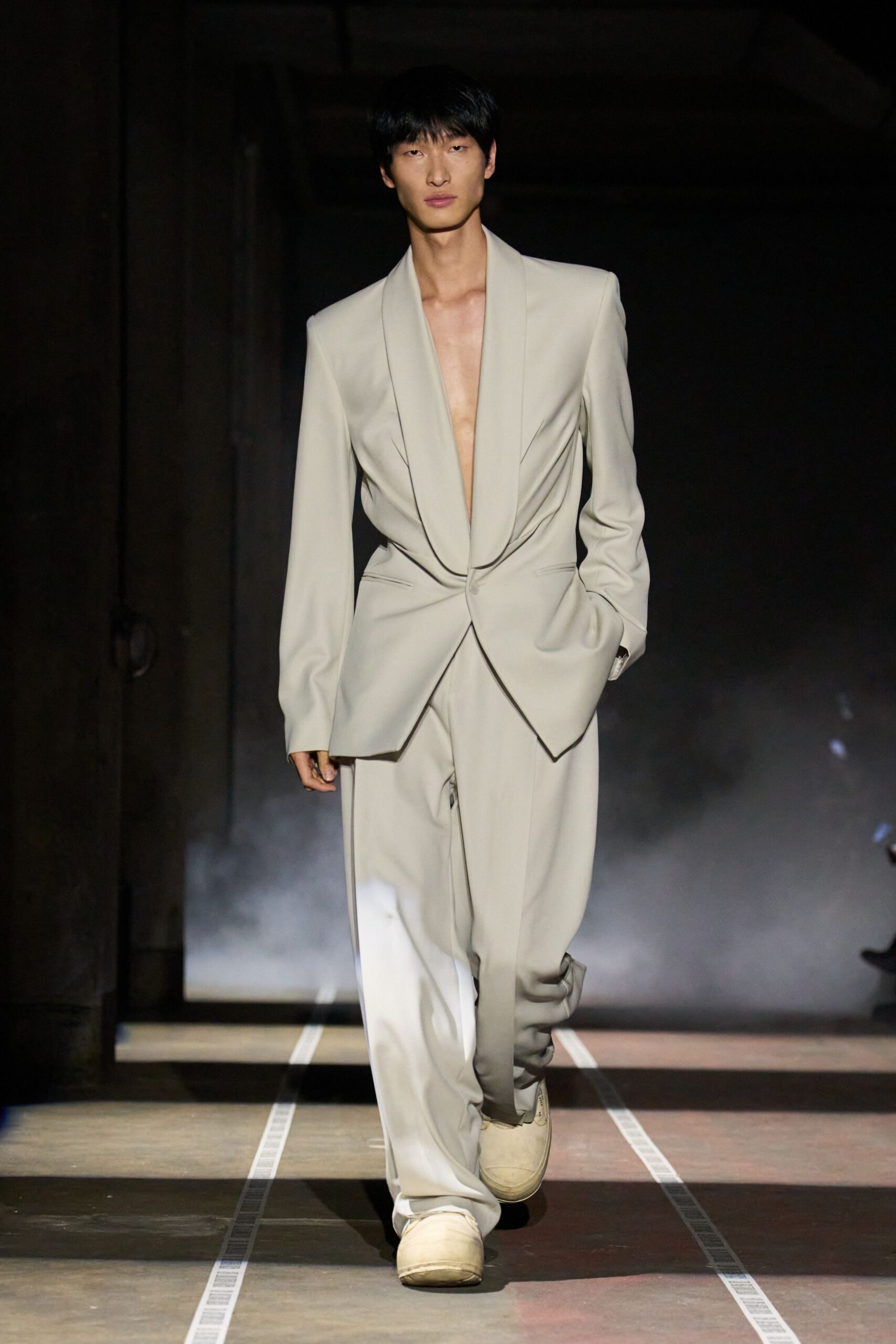 beige relaxed suit with white shoes