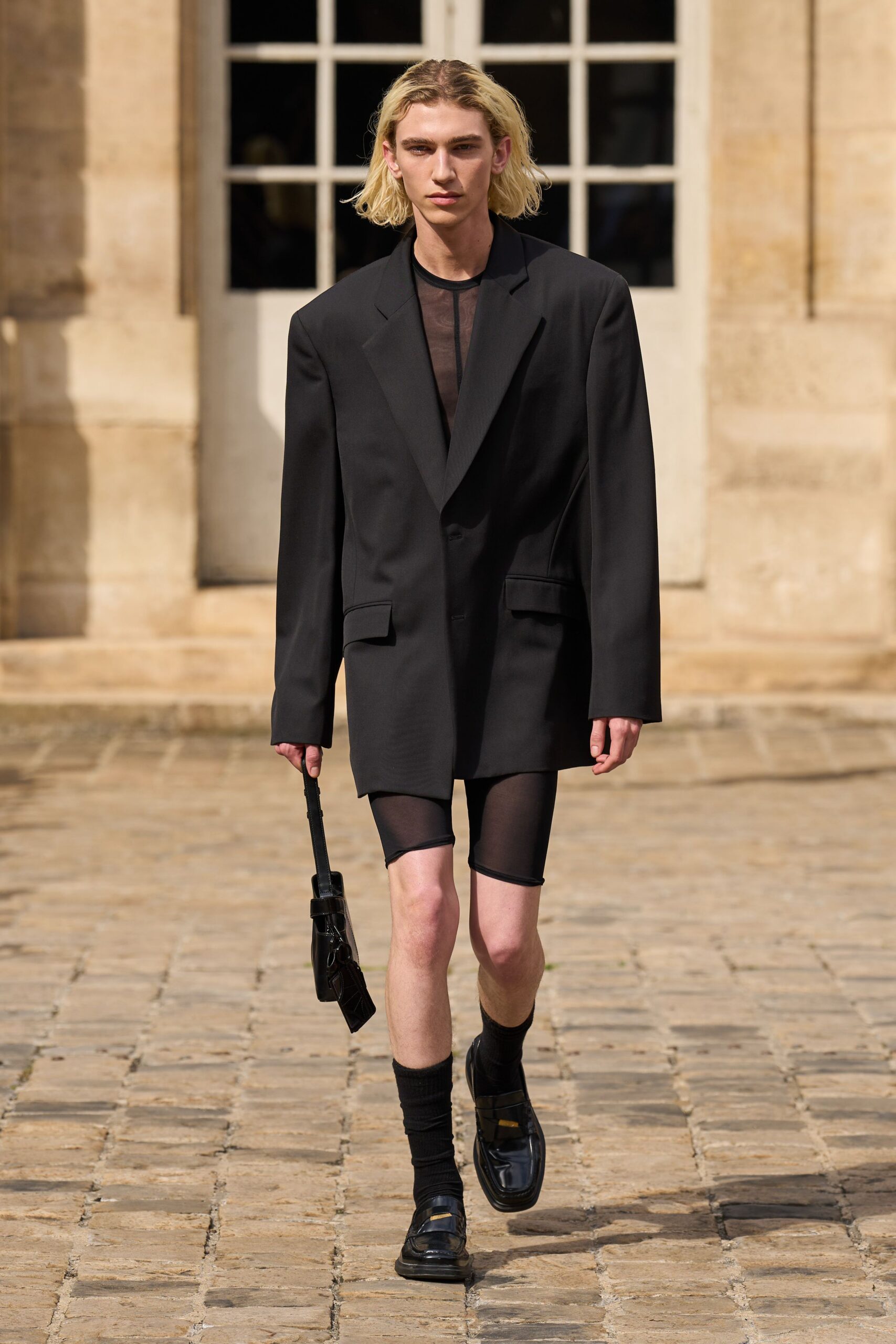 black oversized blazer with fitted shorts