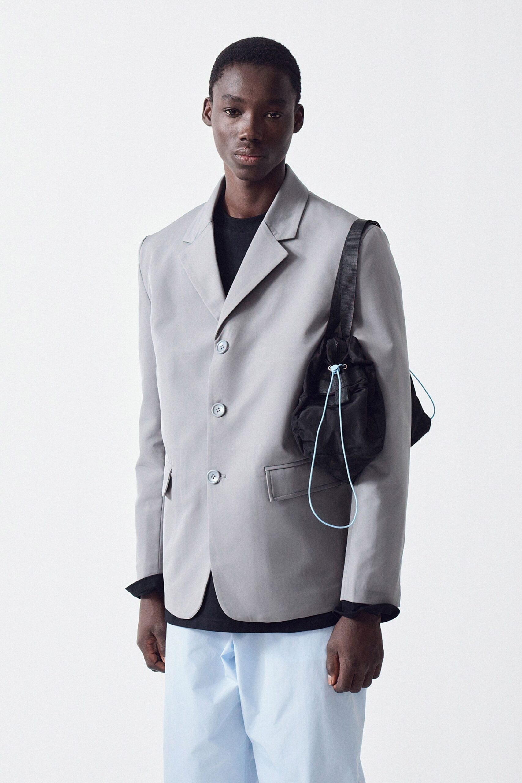 gray blazer with black t-shirt