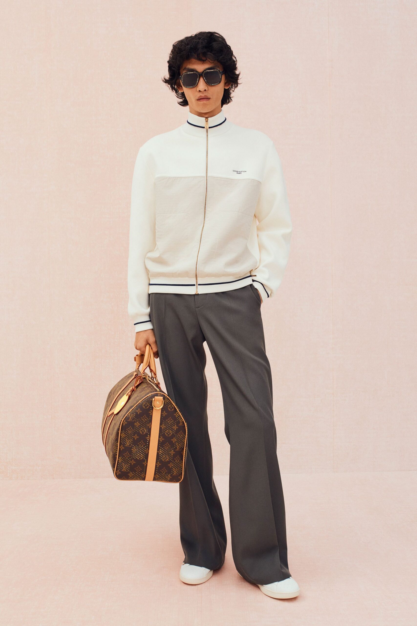 white relaxed jacket with gray pants