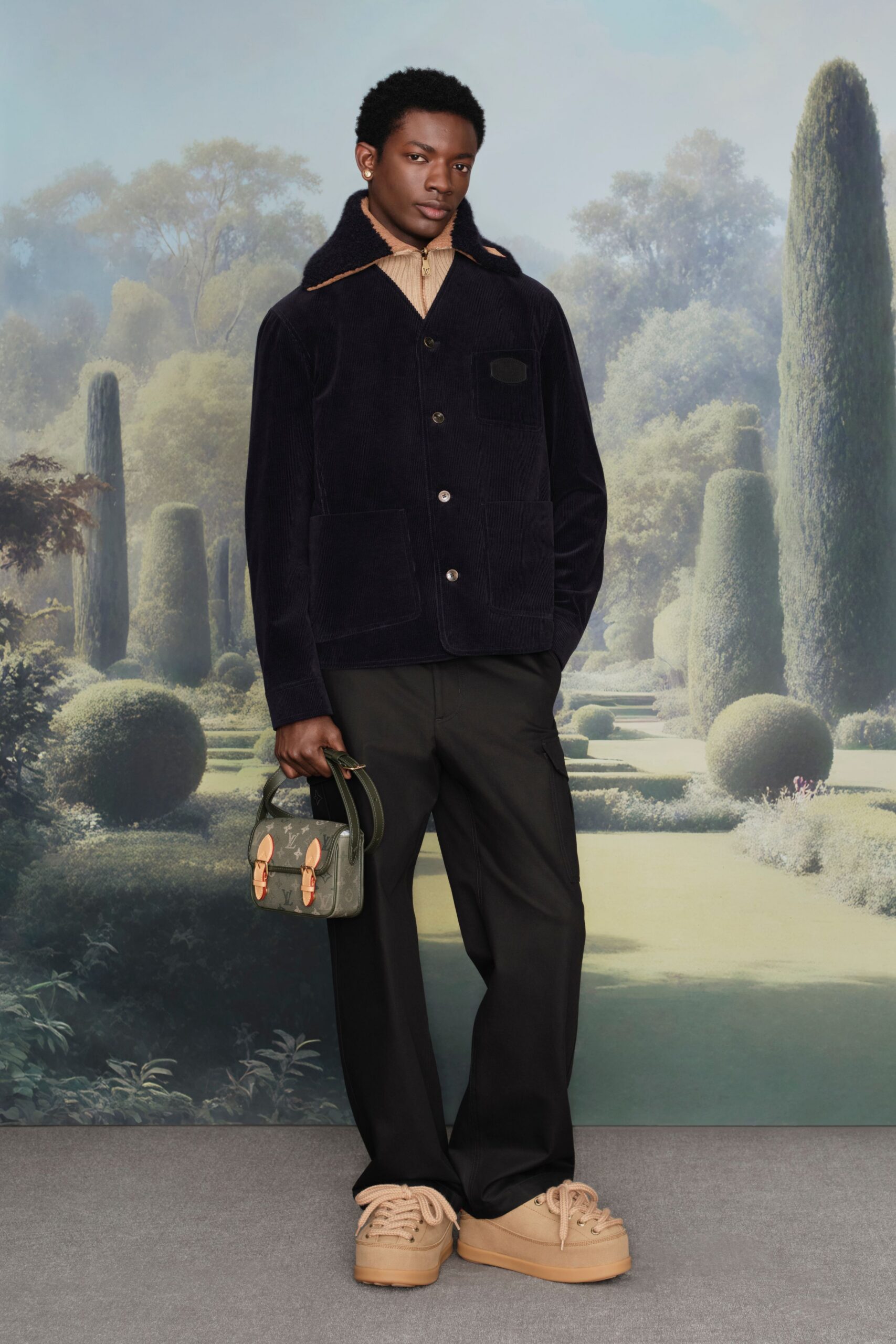 navy jacket beige shirt black pants