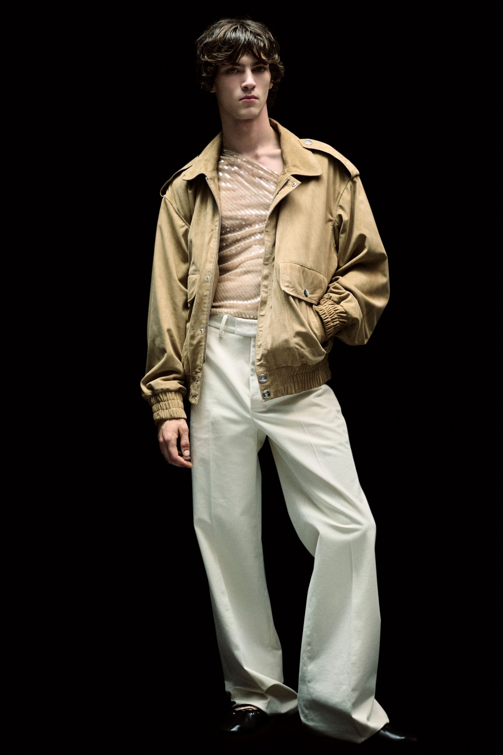 beige jacket brown top white pants