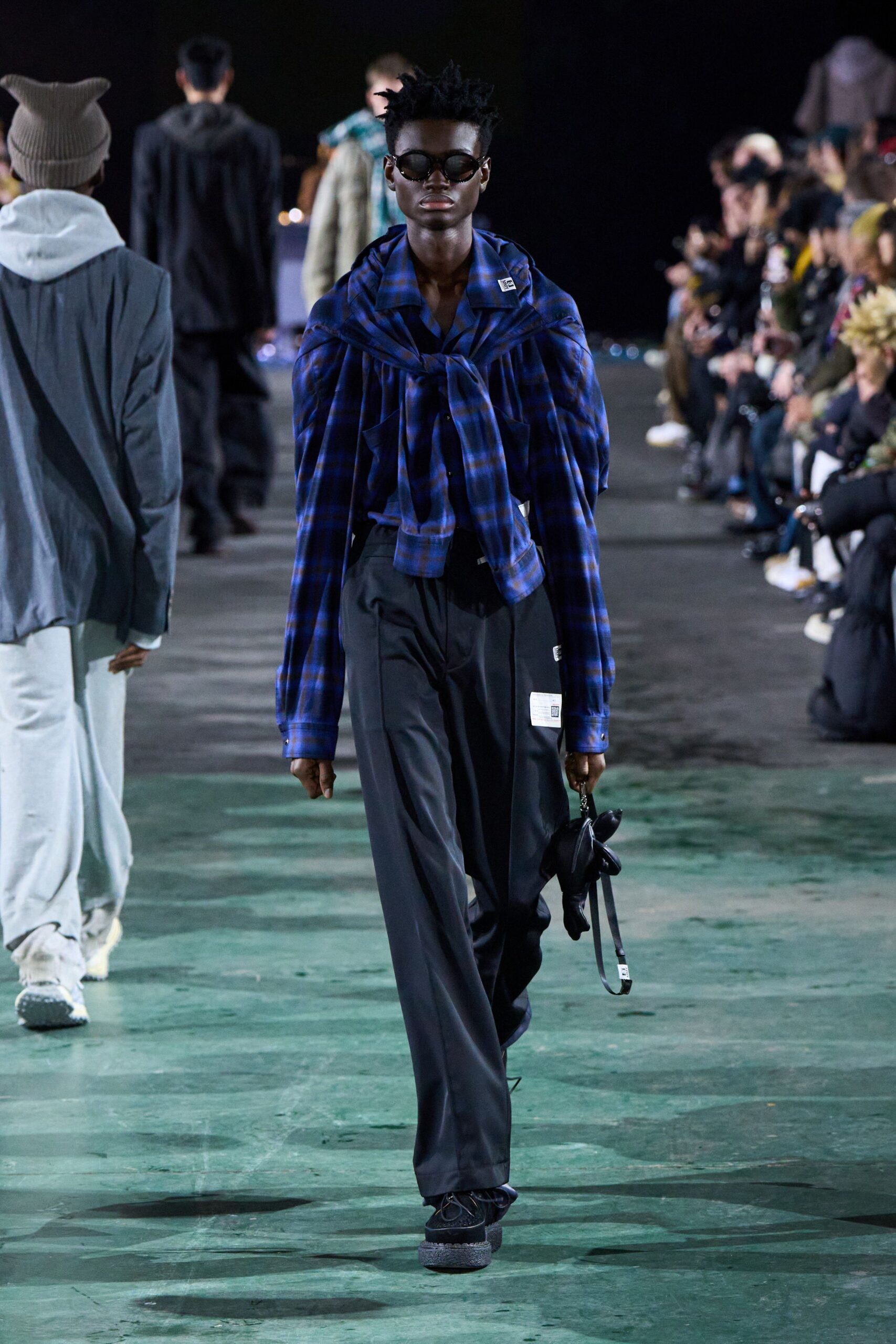 blue checked shirt with black pants