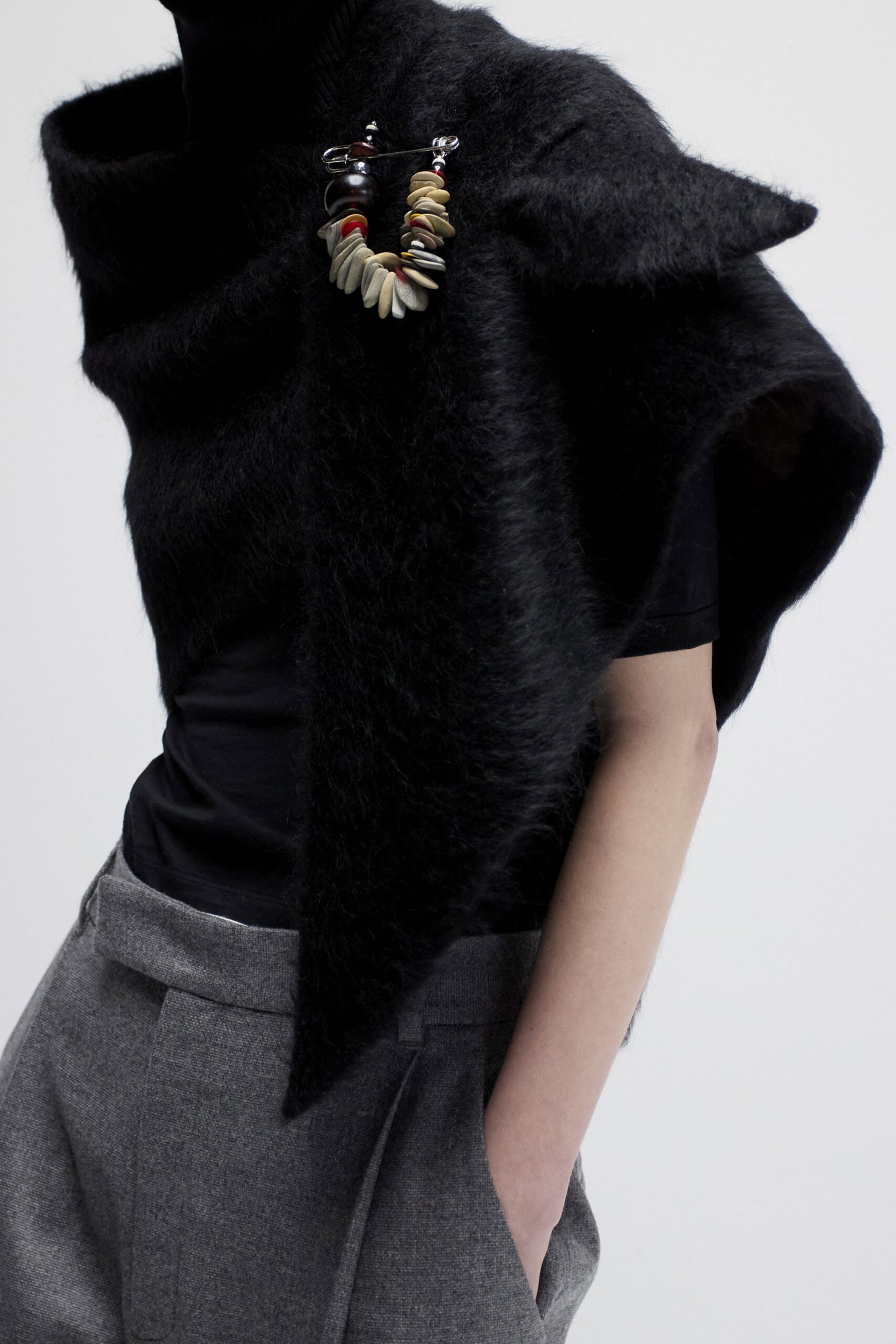 black wool sleeveless high-neck relaxed draped top