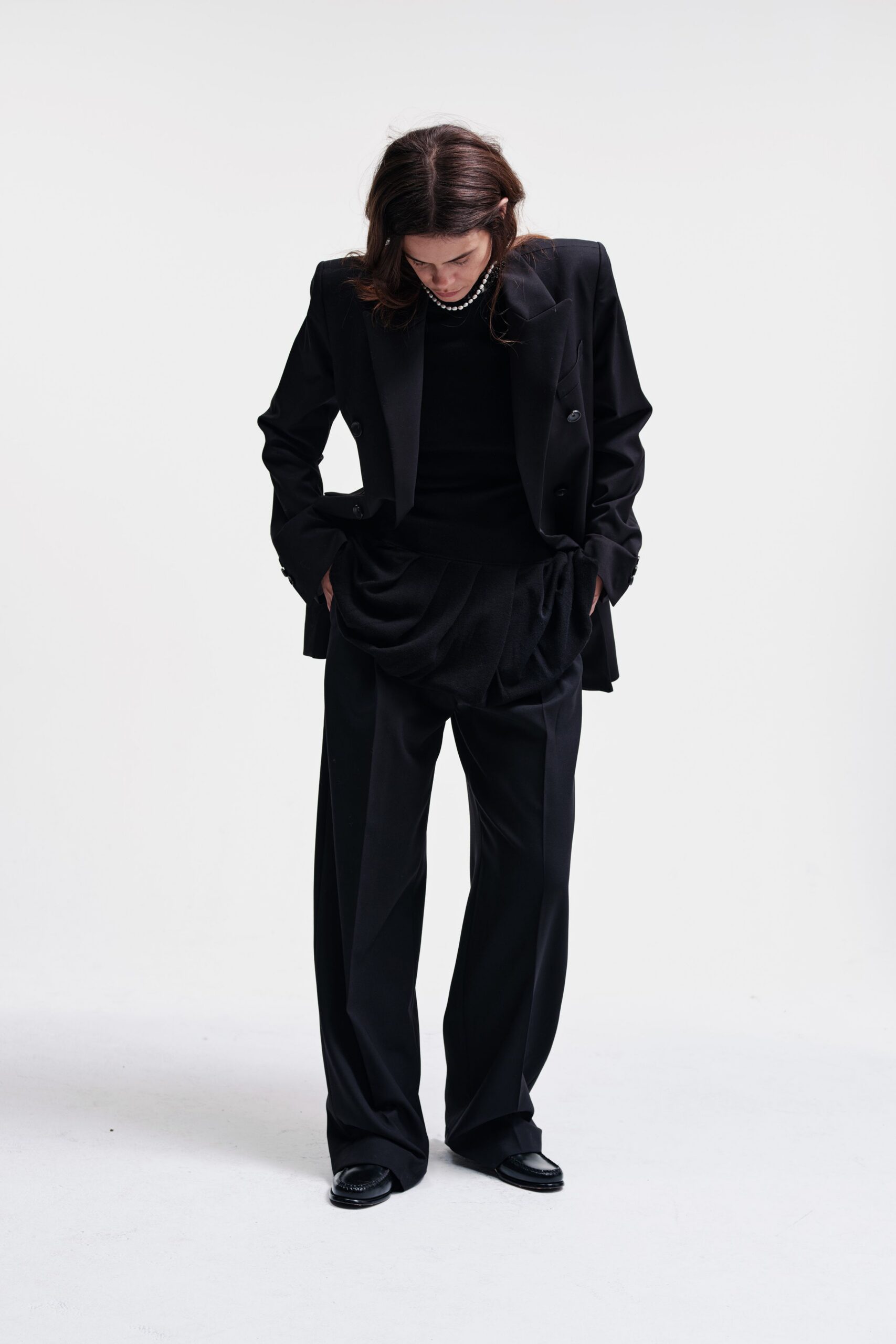 black tailored blazer with relaxed pants