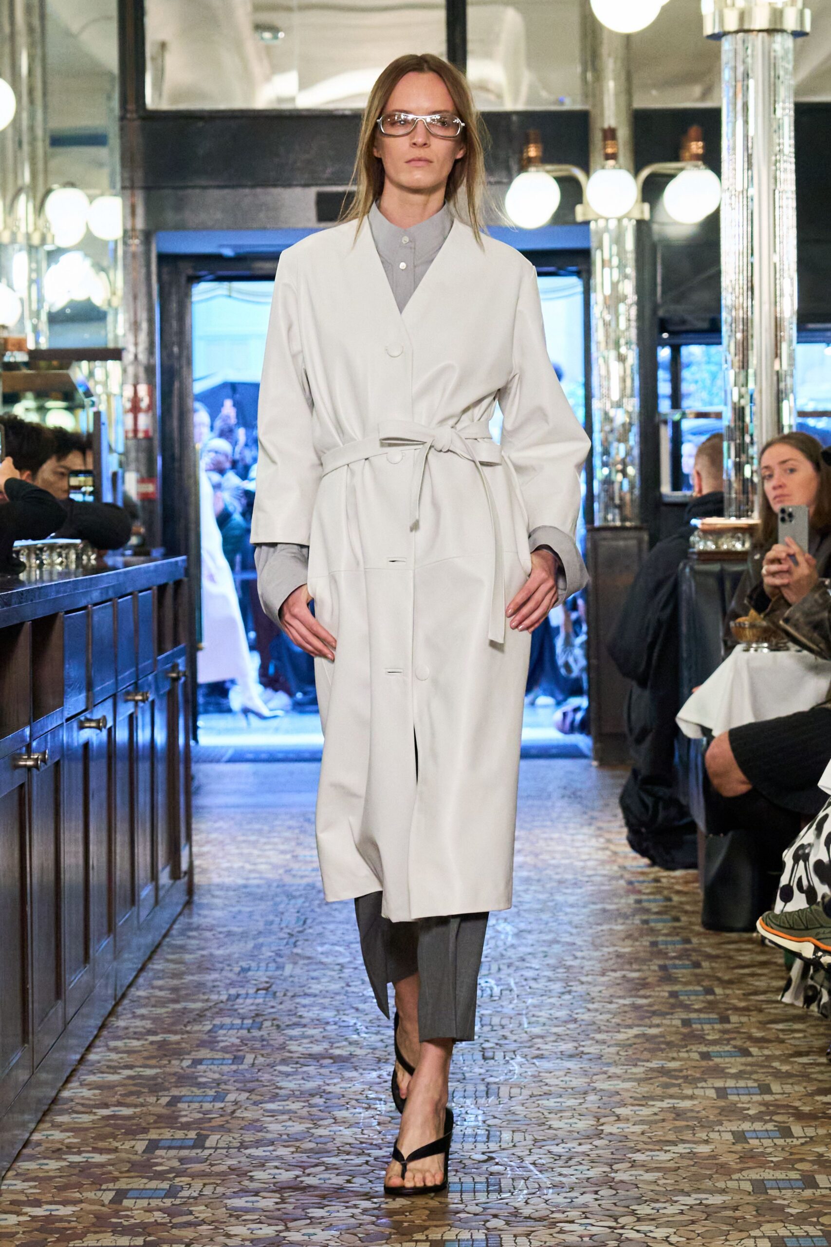 white belted coat with gray shirt