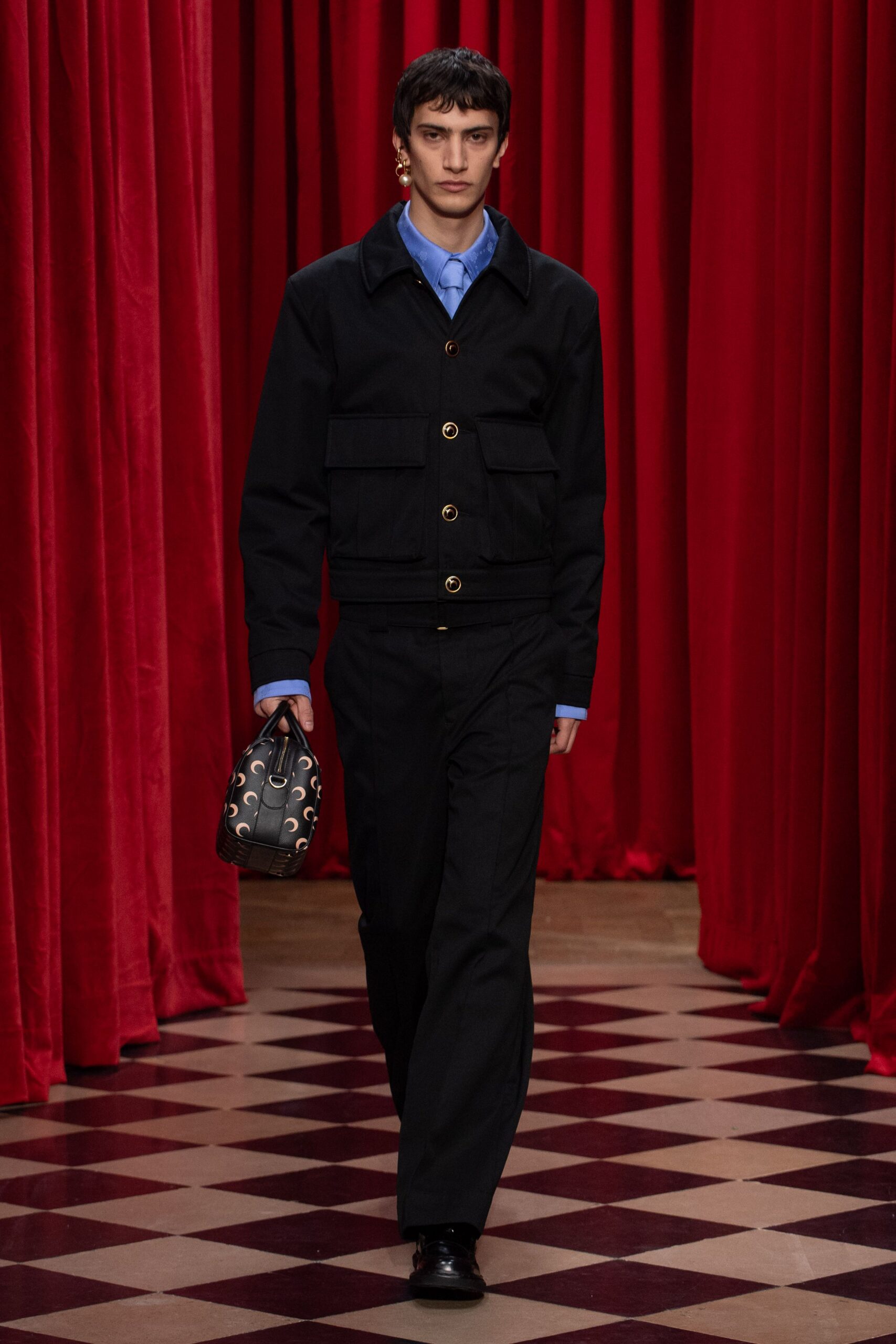 black fitted jacket with blue shirt