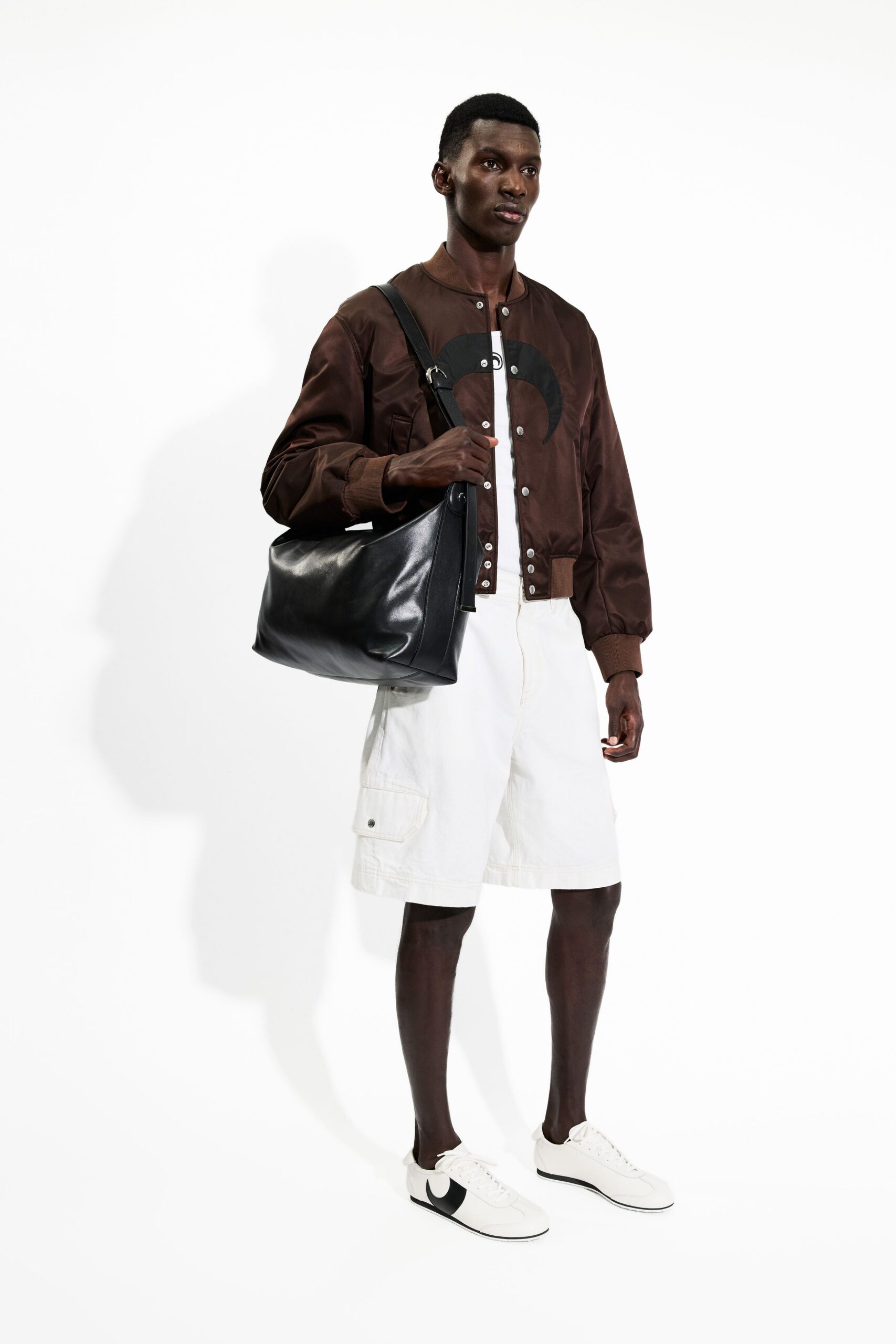 brown jacket white shorts