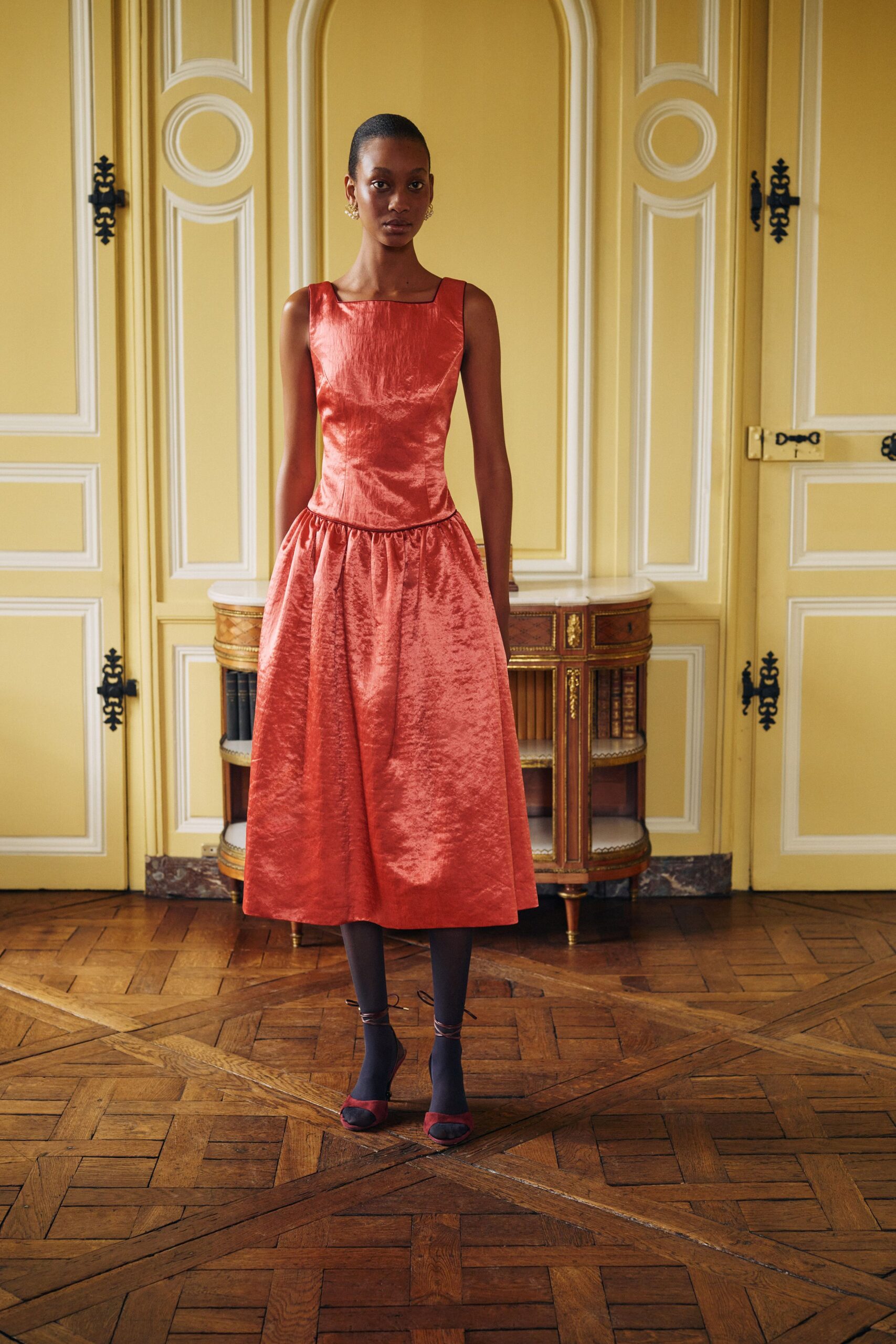red silk sleeveless square-neck fitted pleated midi dress