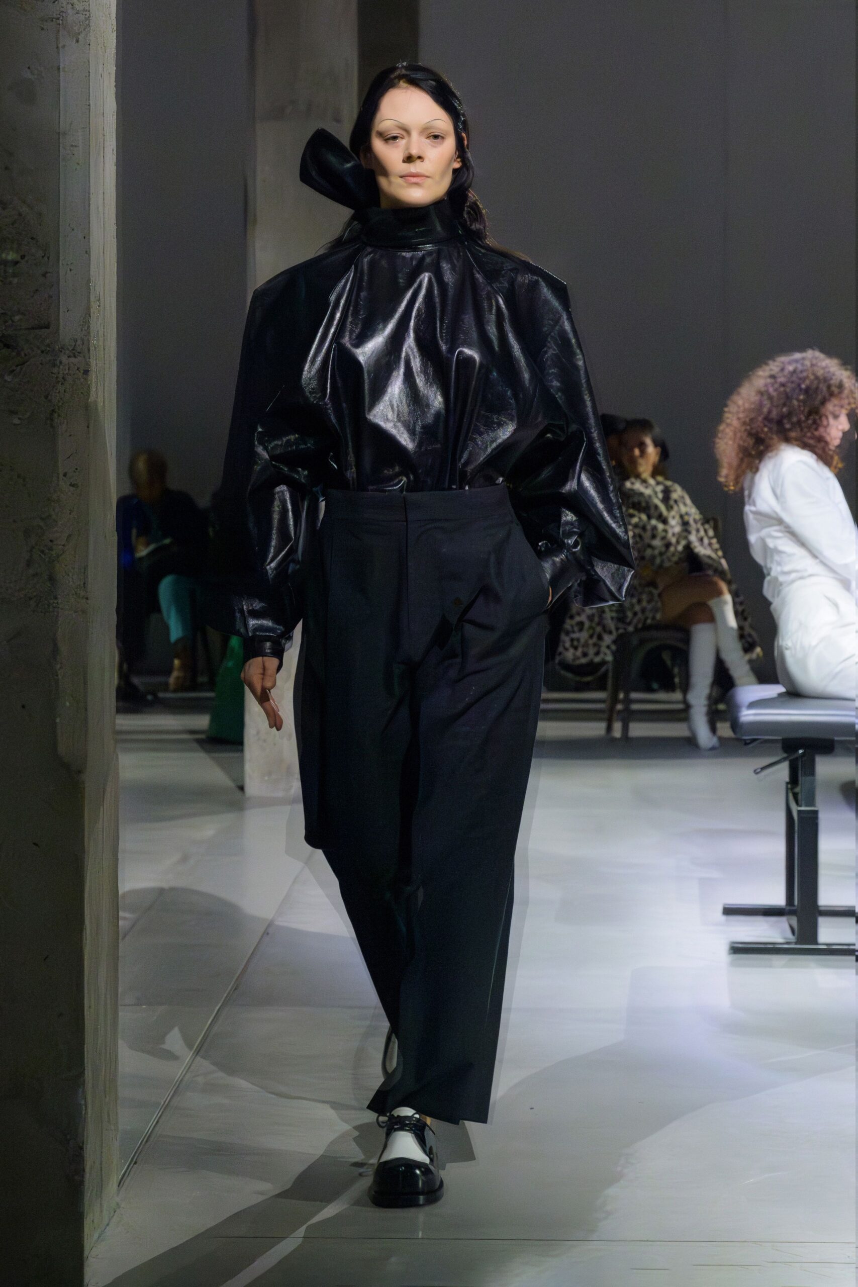 black leather long-sleeve high-neck relaxed padded top
