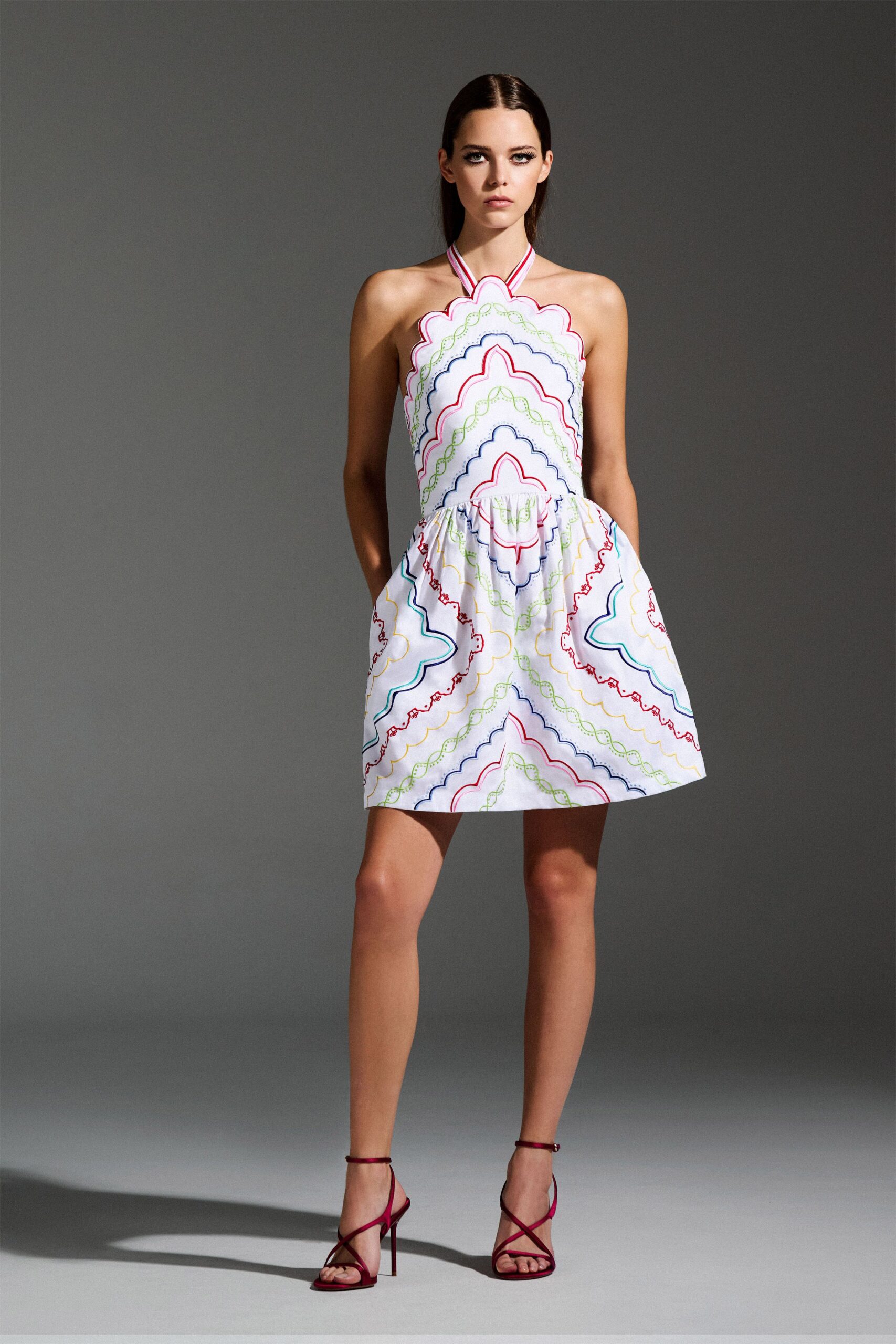 multi-colored mini dress with red shoes