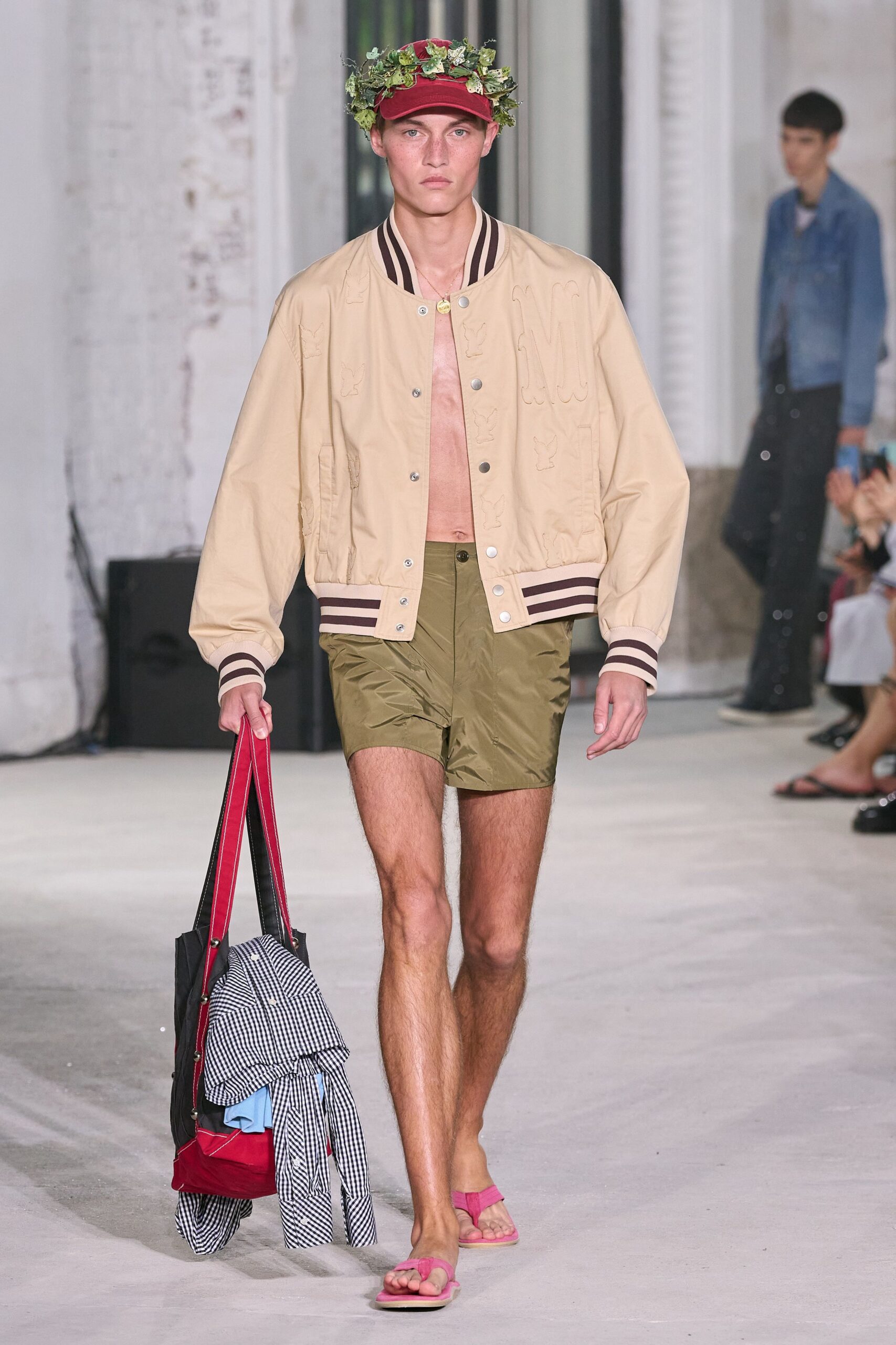 beige jacket with green shorts