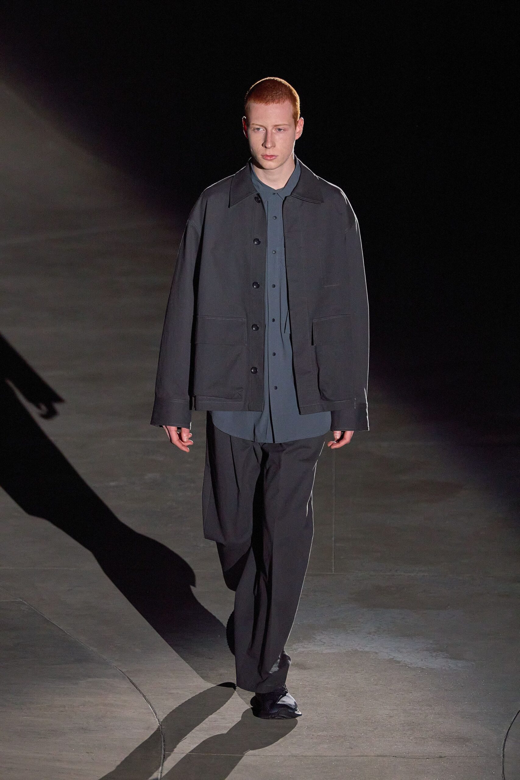 gray jacket blue shirt relaxed pants
