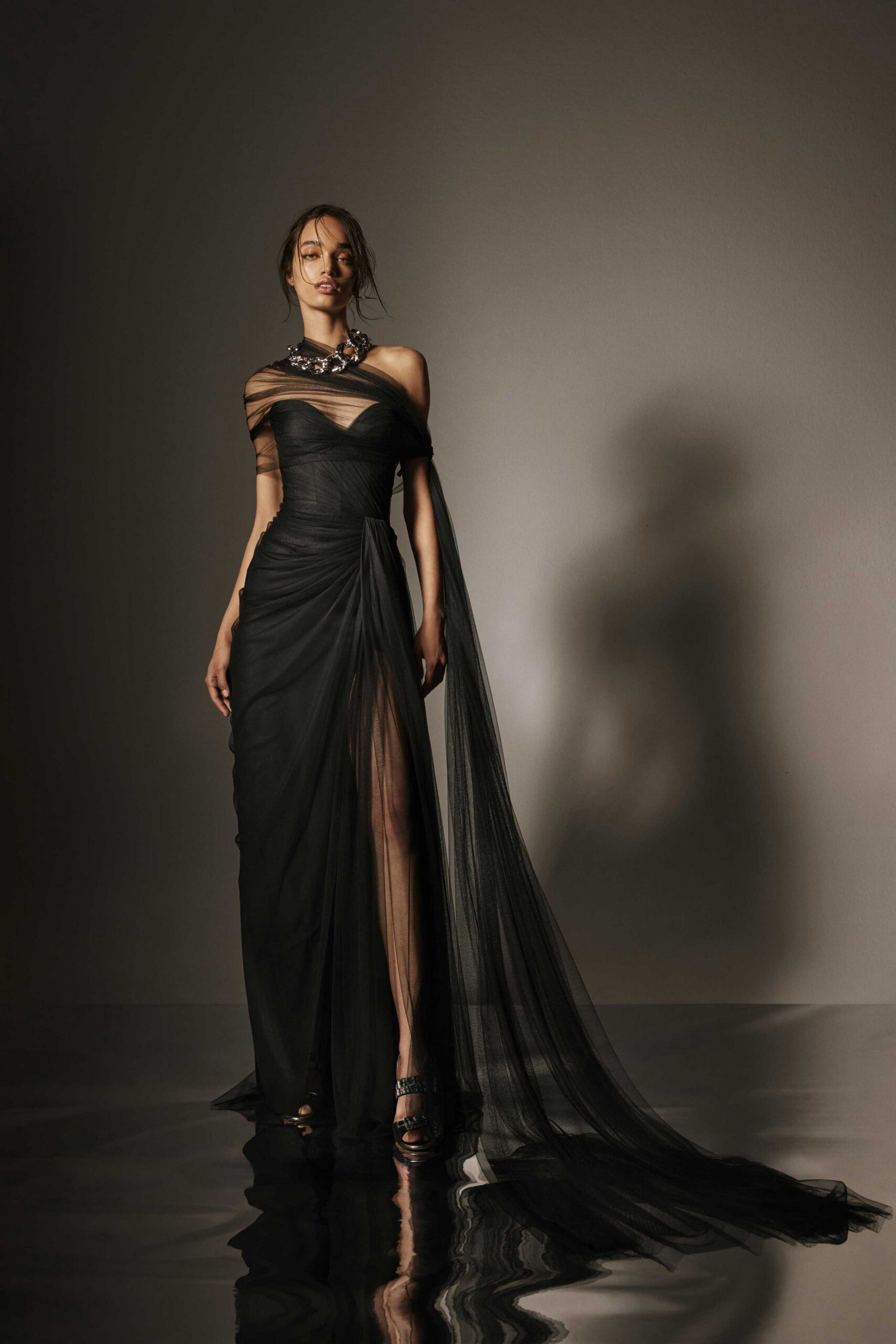 black silk off-shoulder long-sleeve fitted draped flowing gown