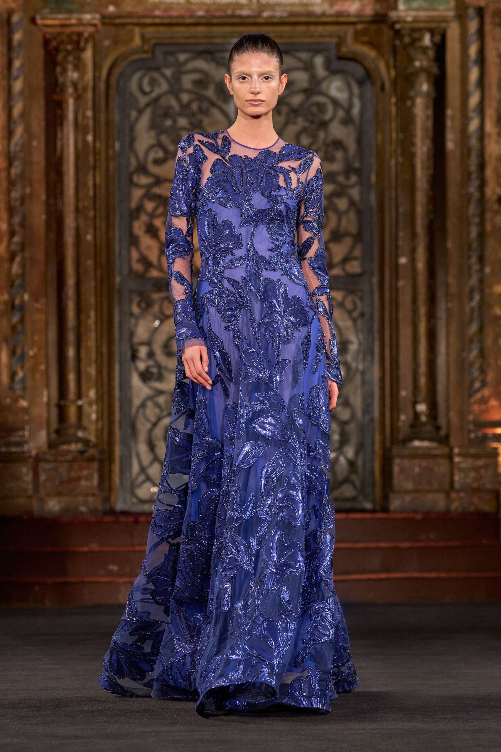 blue embroidered long-sleeve gown