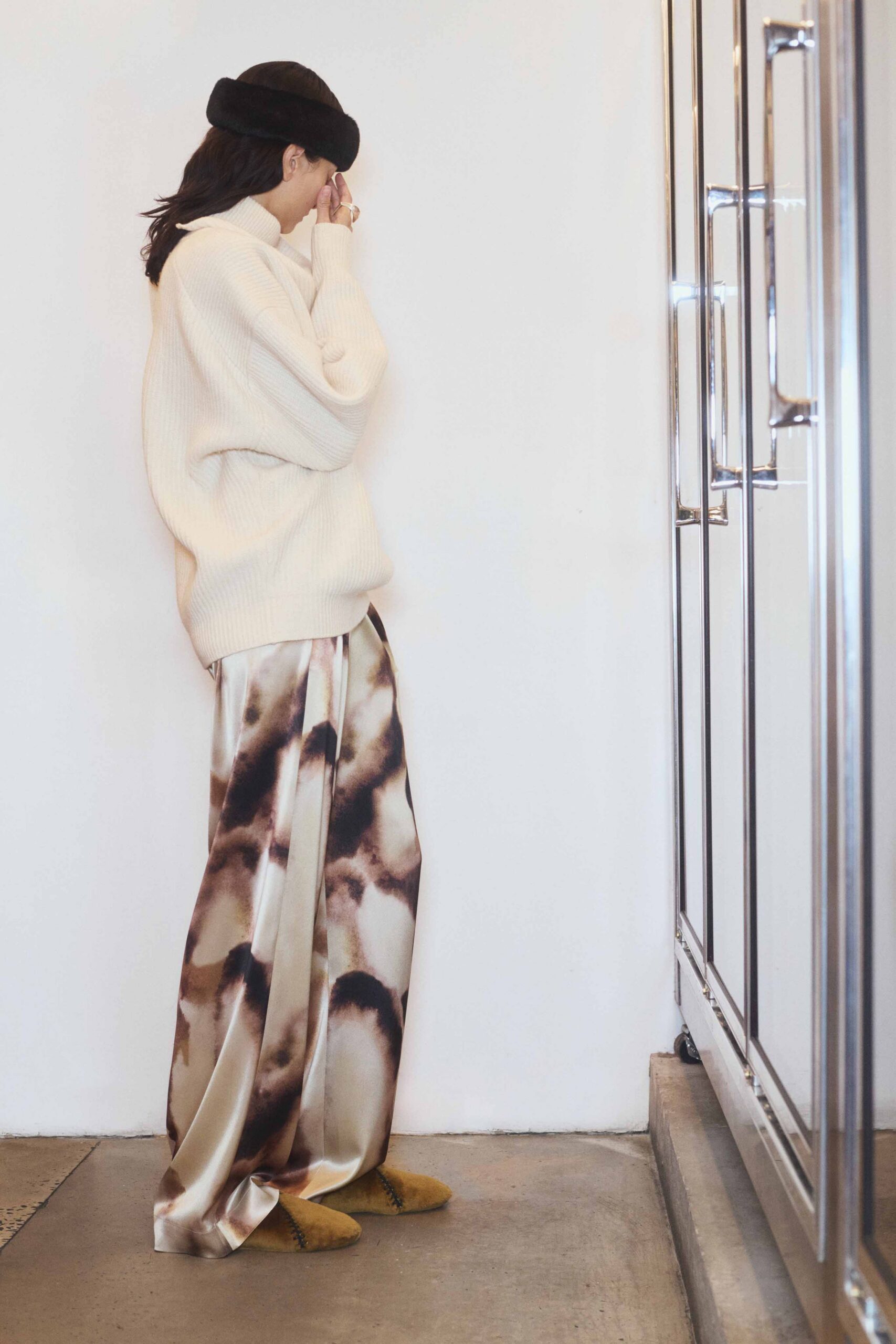 white oversized sweater with multi pants