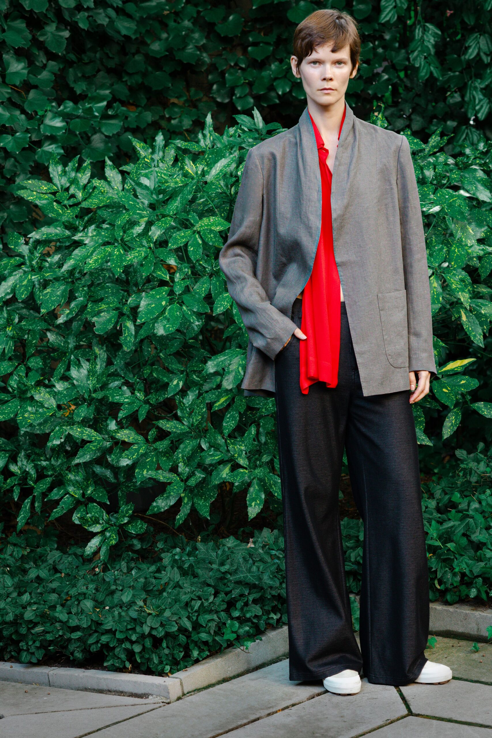 gray blazer red shirt black pants