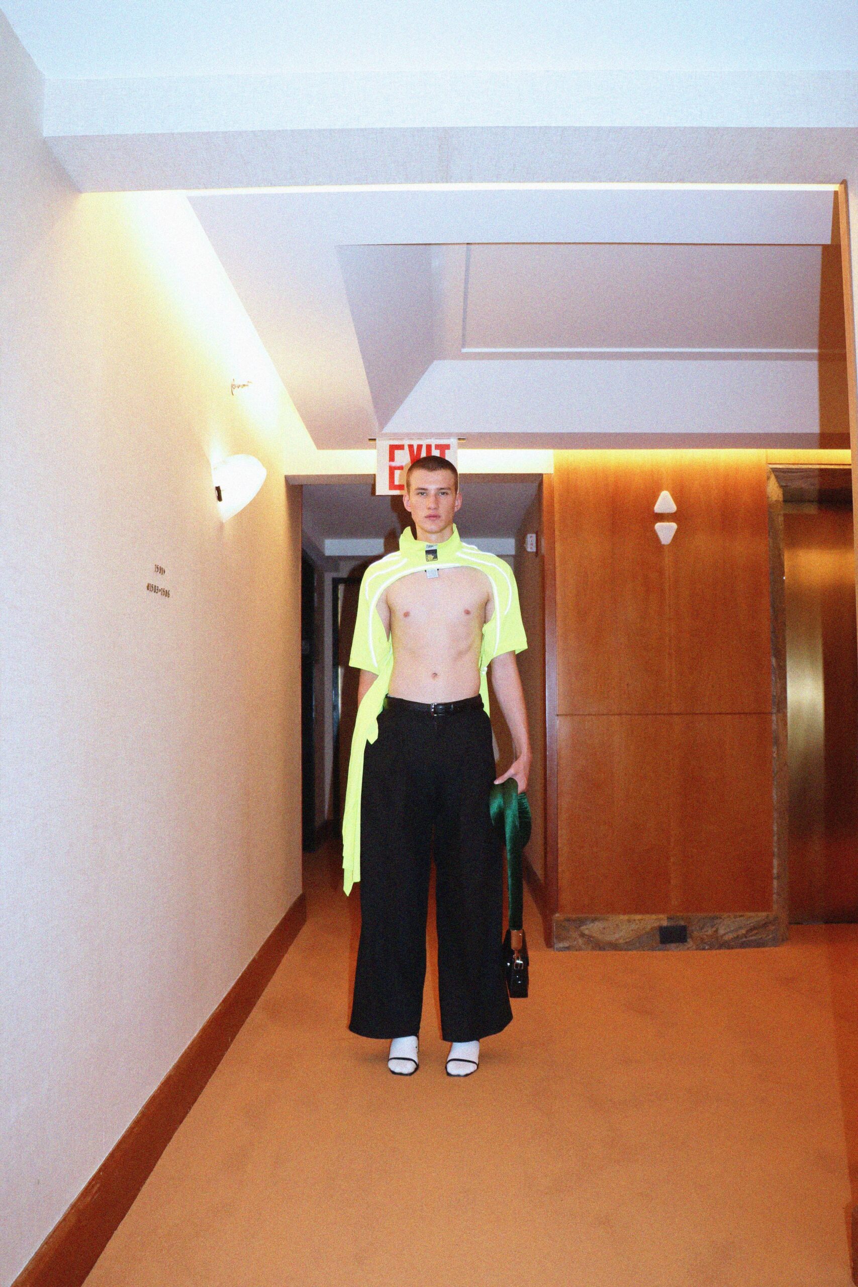 neon green fitted top with black wide-leg pants