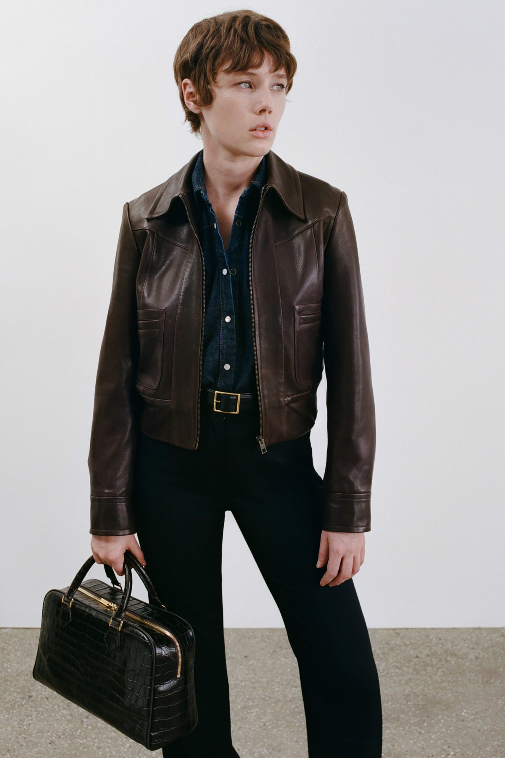 brown leather jacket with denim shirt