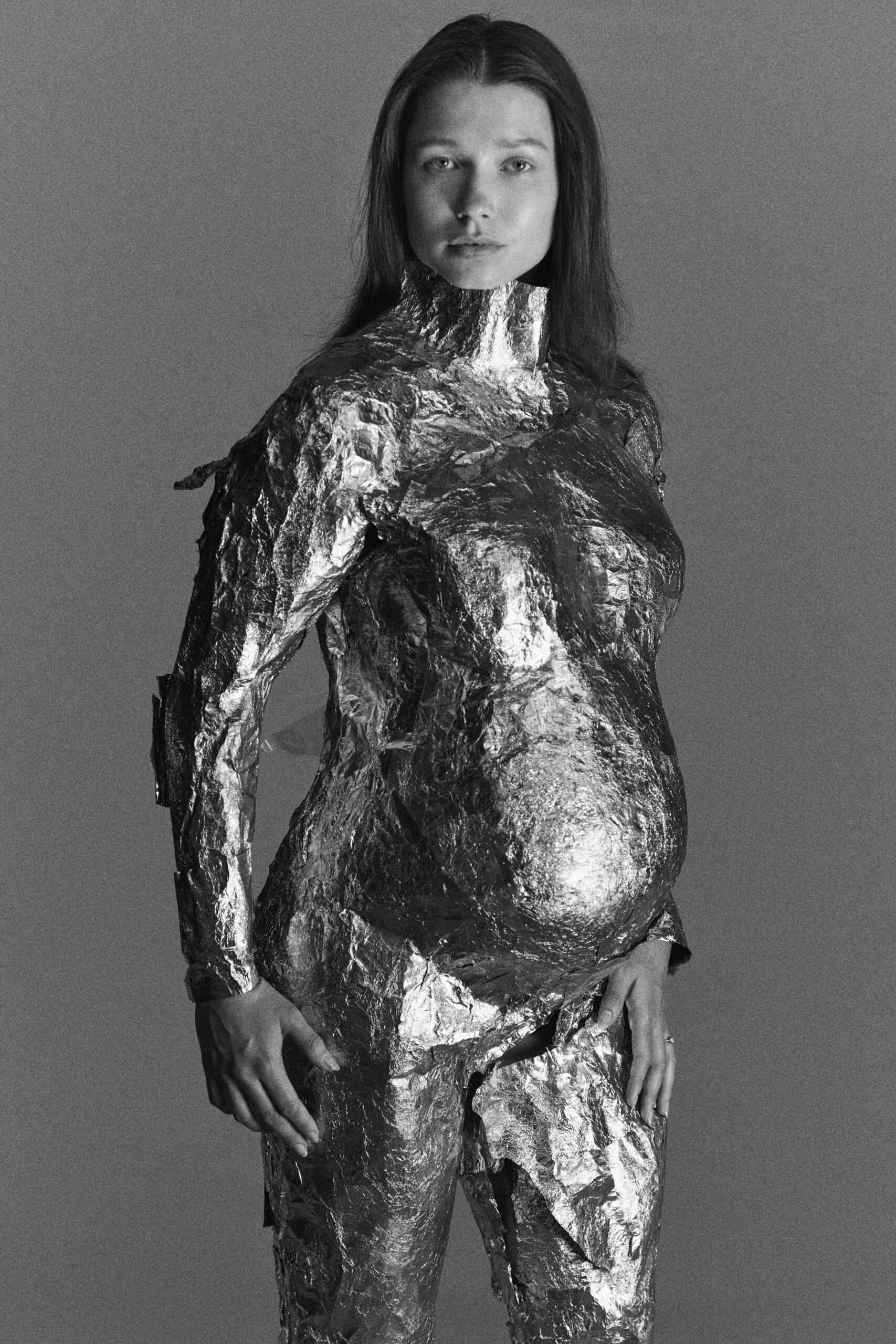 shiny silver fitted catsuit