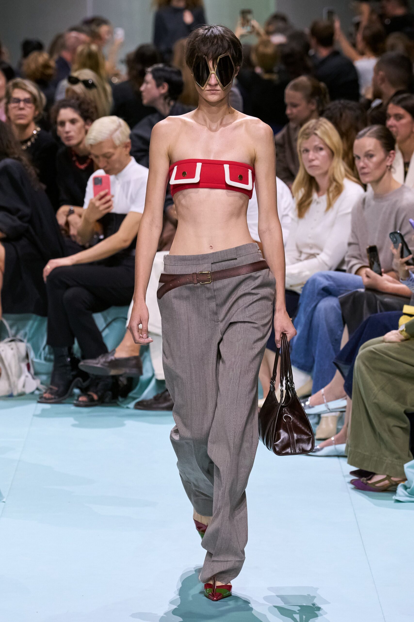 red sleeveless fitted buttoned cropped top