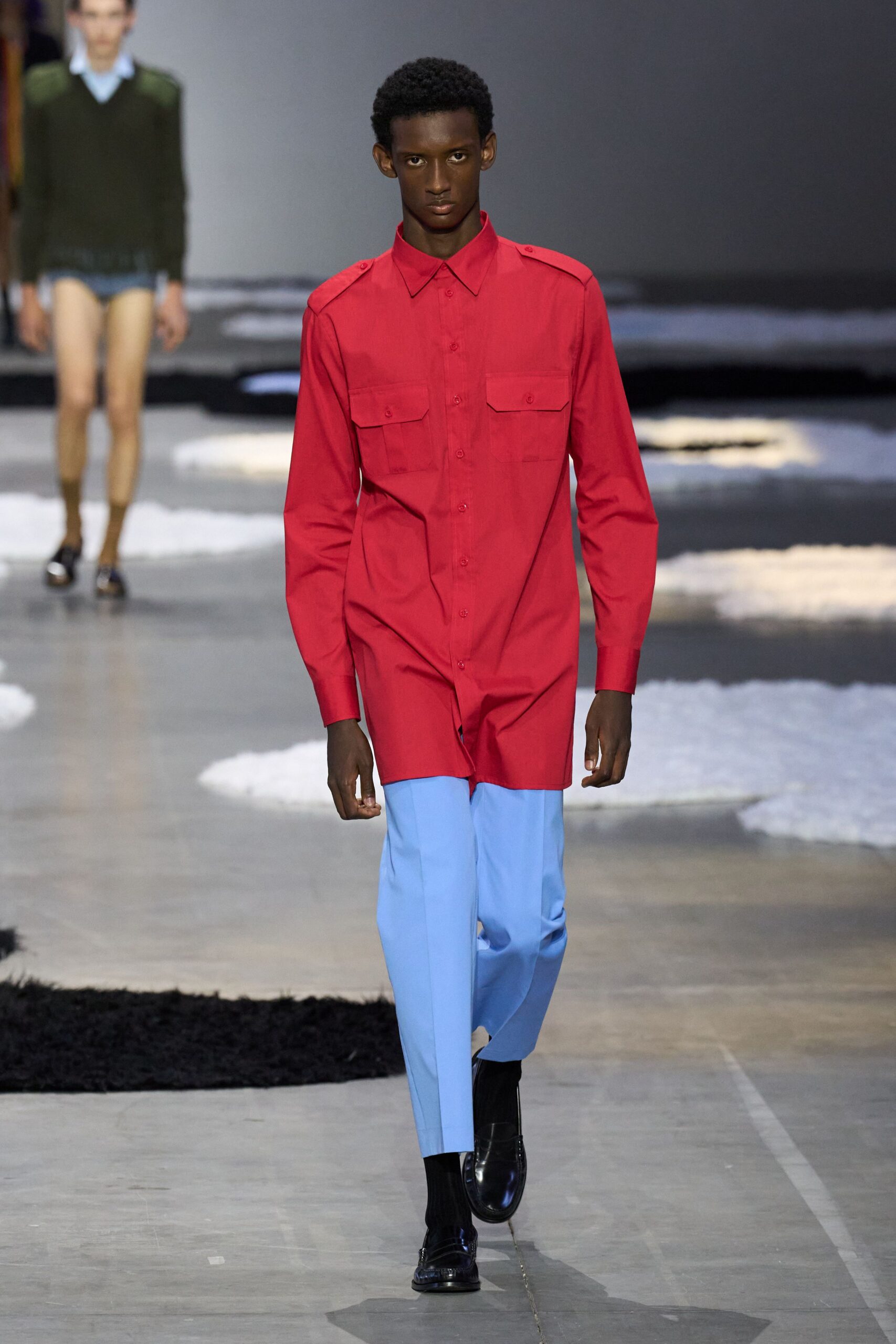 red shirt blue pants black shoes