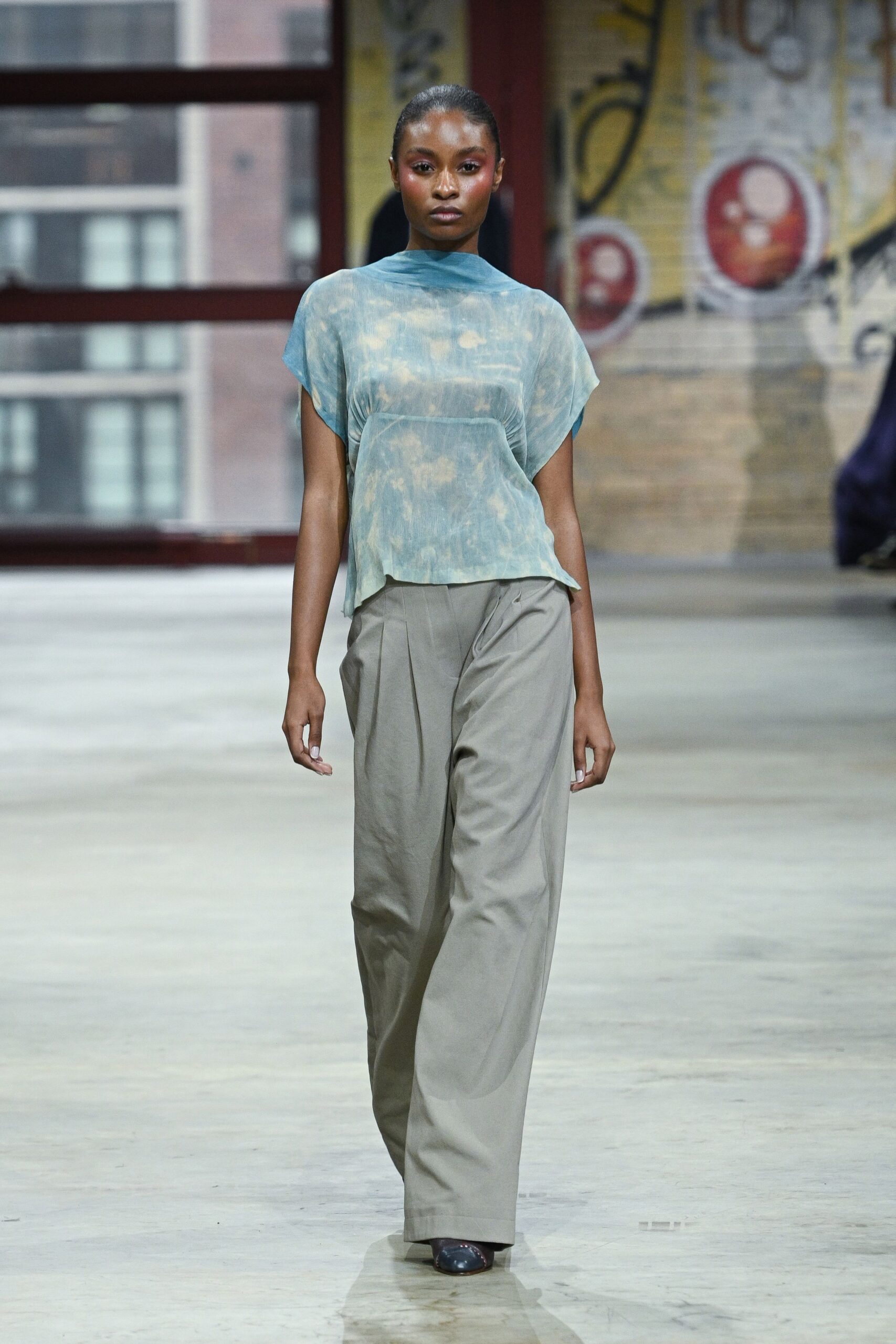 blue chiffon sleeveless high-neck relaxed sheer flowing top