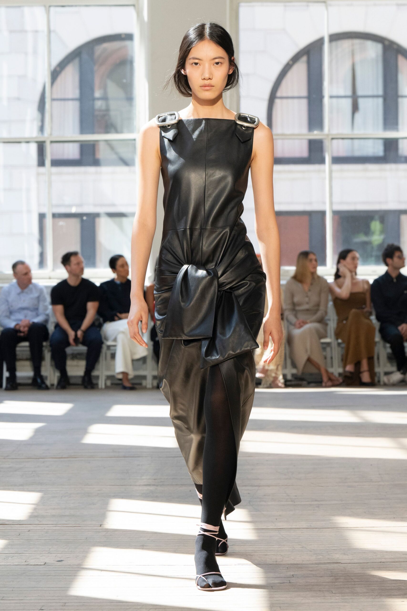 black leather sleeveless v-neck fitted draped midi dress