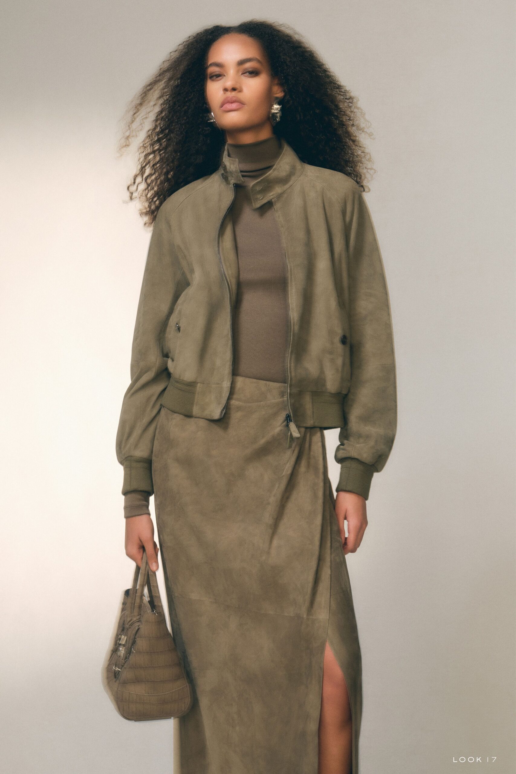 green suede long-sleeve collared fitted zippered jacket