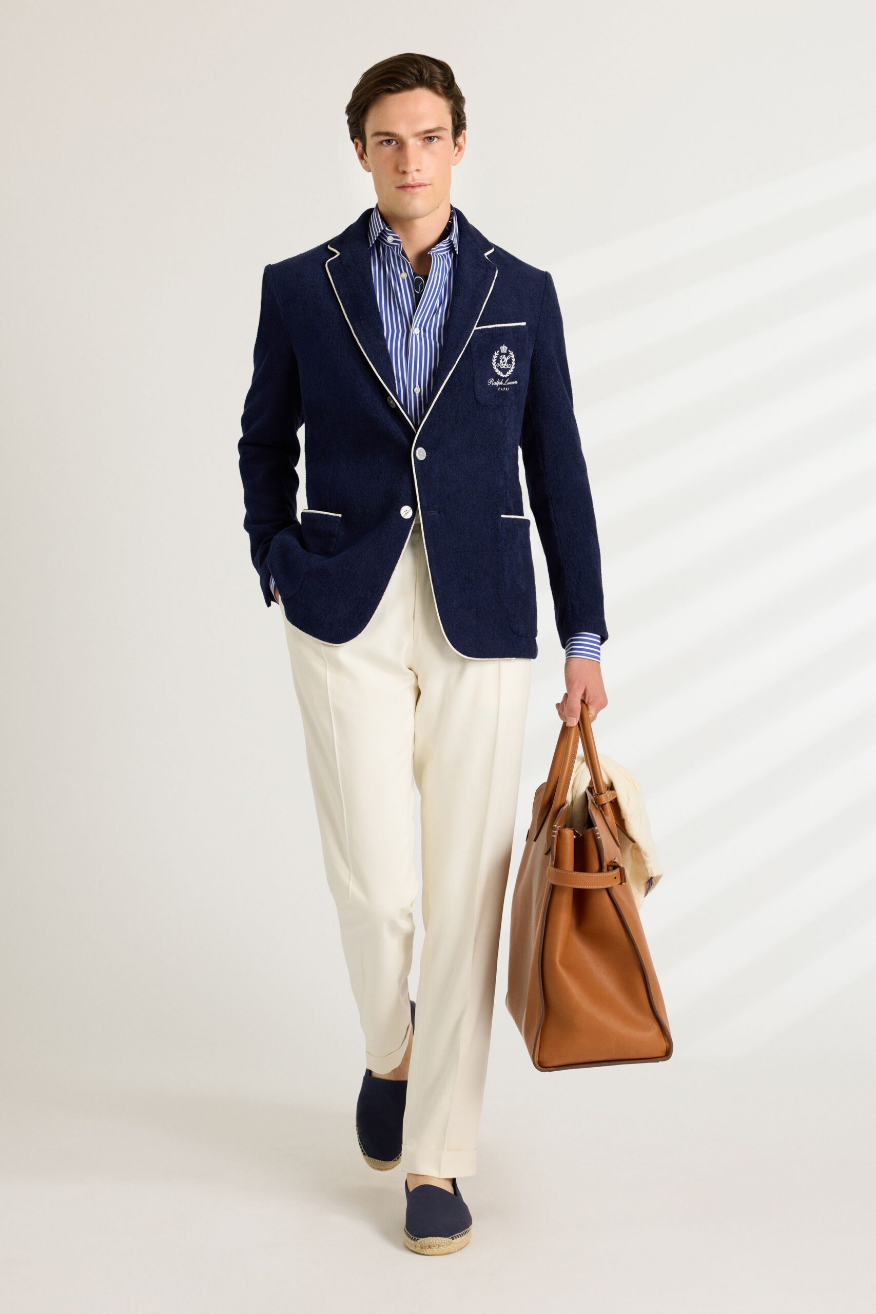 blue tailored blazer with white pants