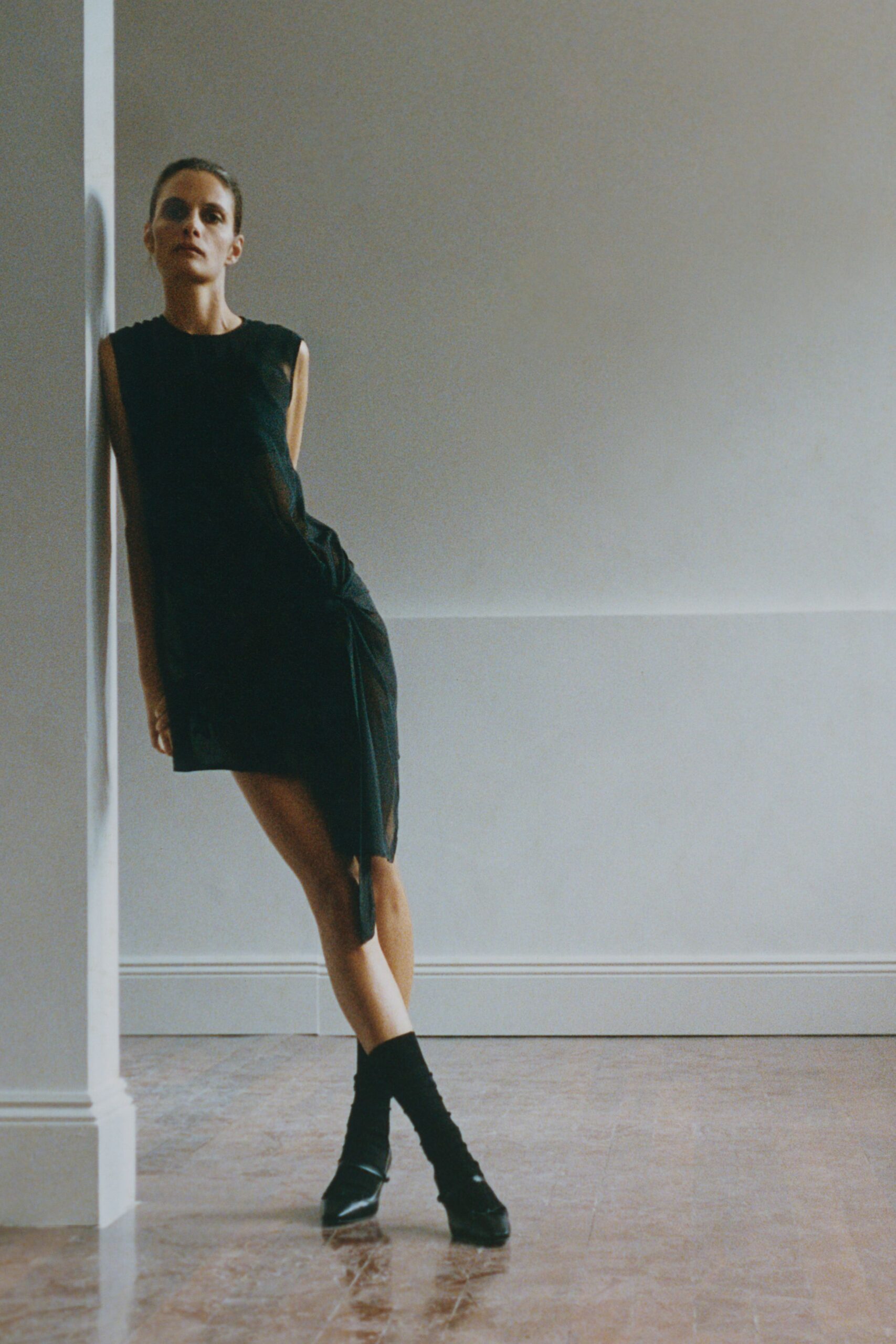 black silk sleeveless v-neck fitted draped mini dress