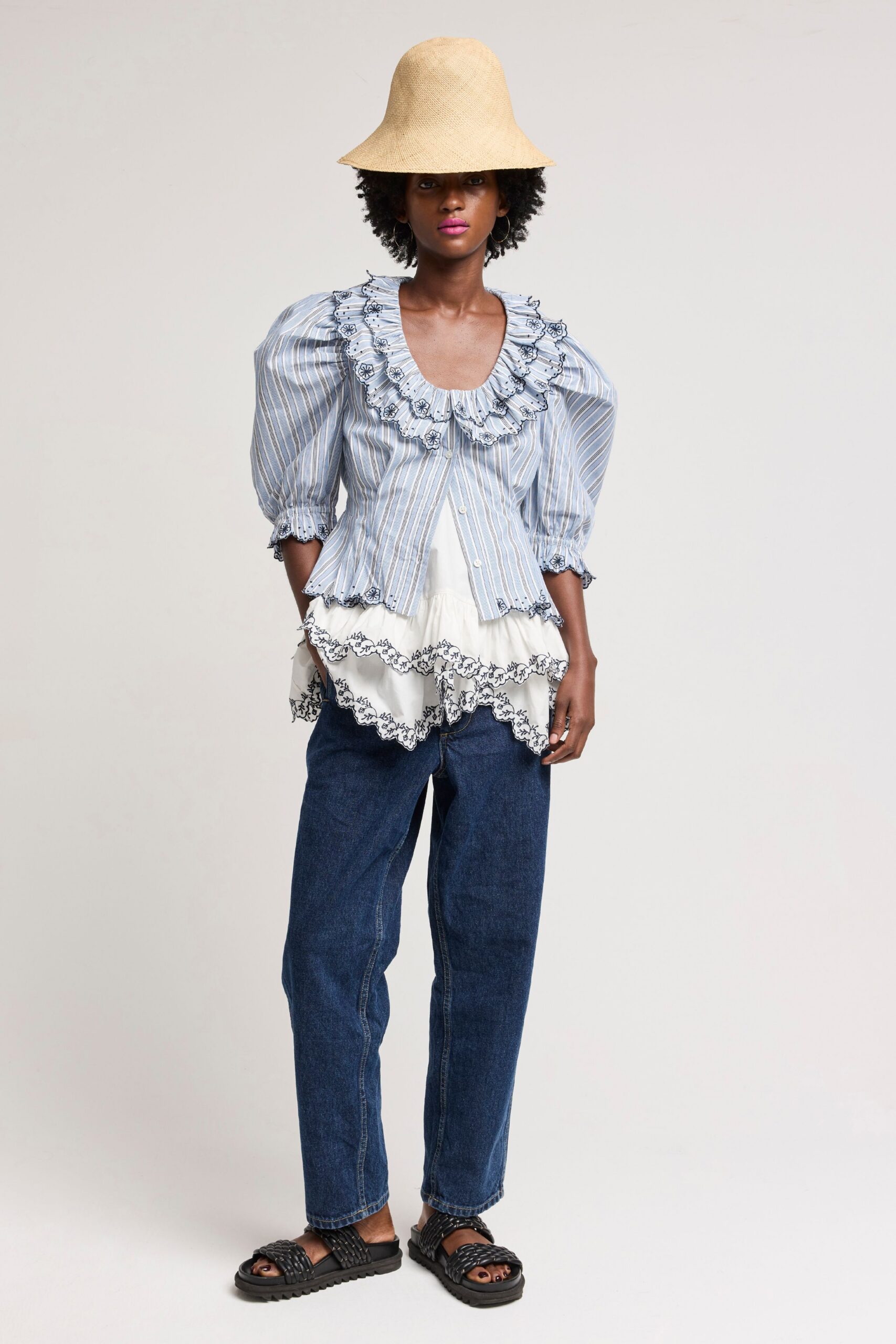 blue and white ruffled top with denim pants