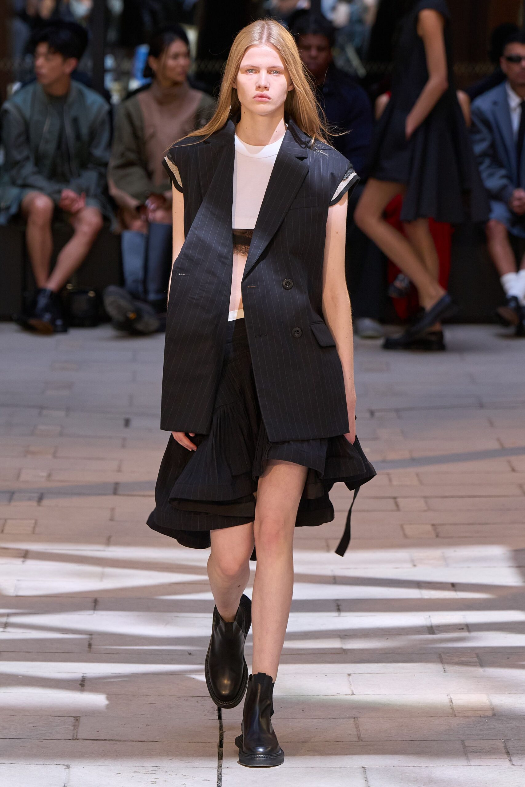 black blazer white top pleated skirt