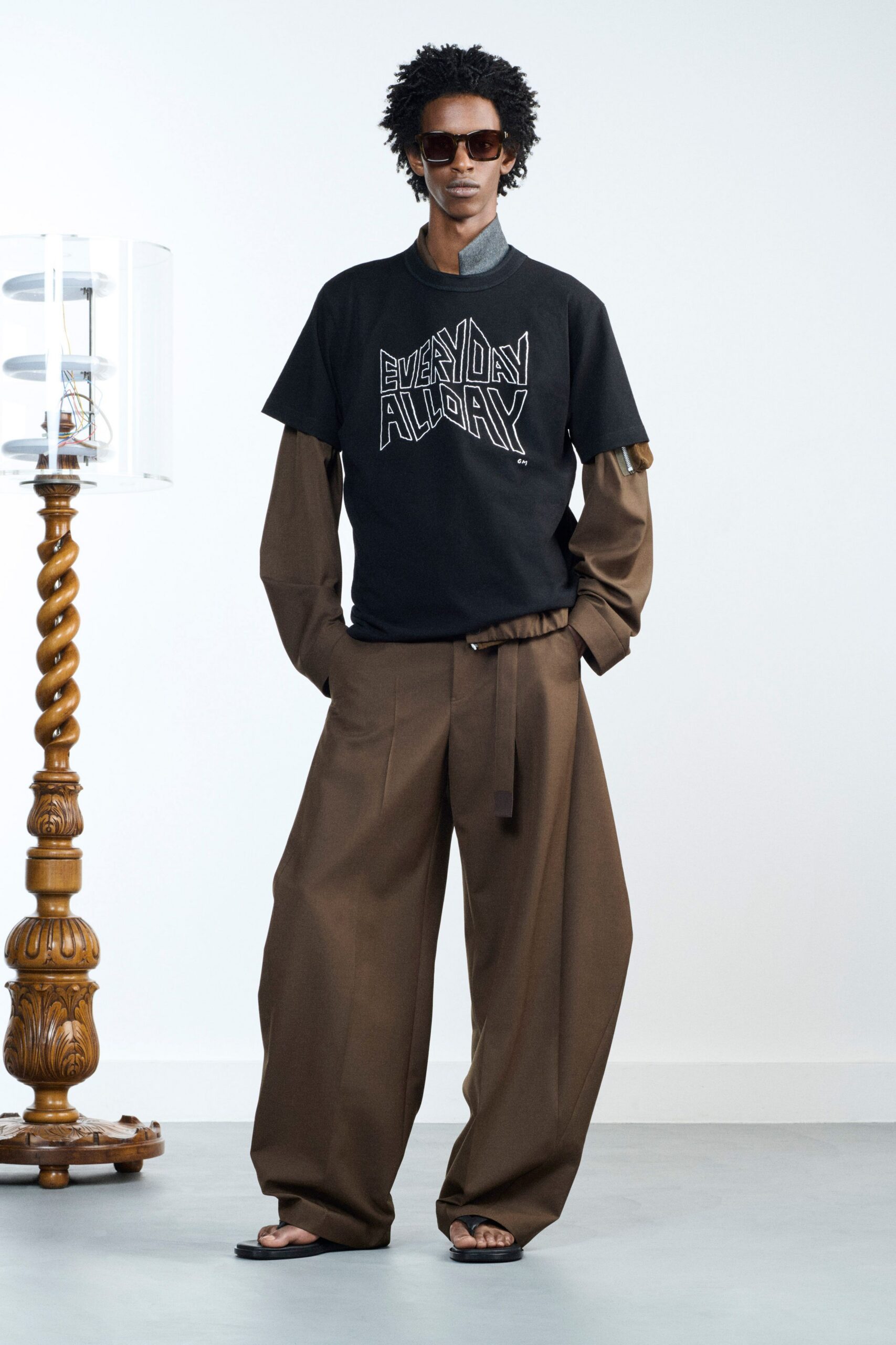 black t-shirt brown wide-leg pants