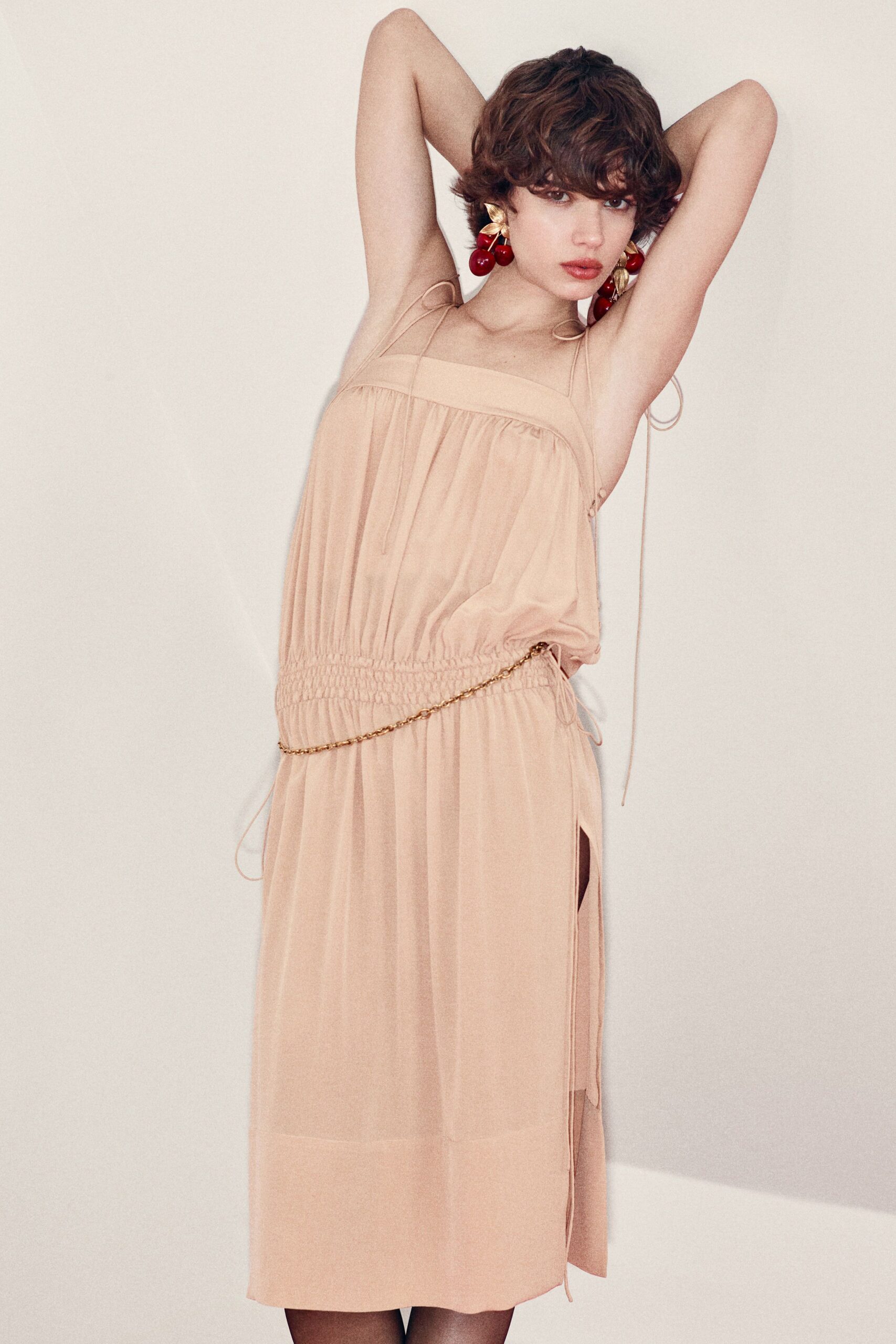 beige silk sleeveless dress