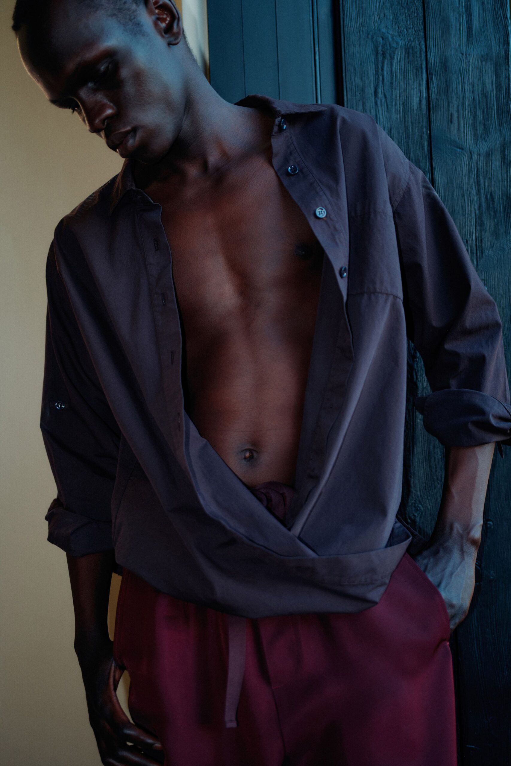 brown relaxed shirt with red pants
