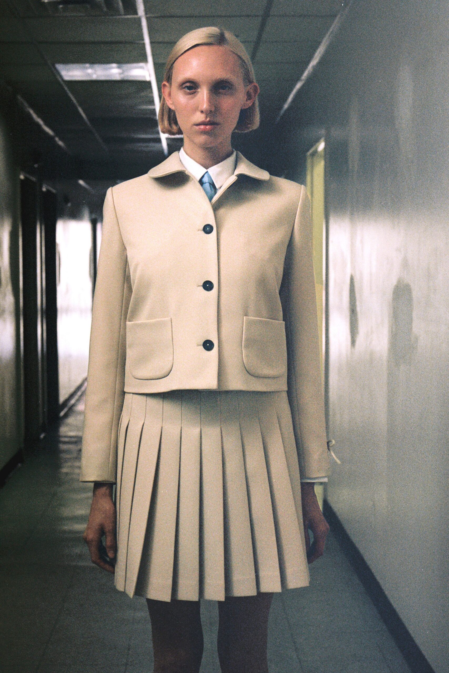 beige cotton fitted pleated a-line mini skirt