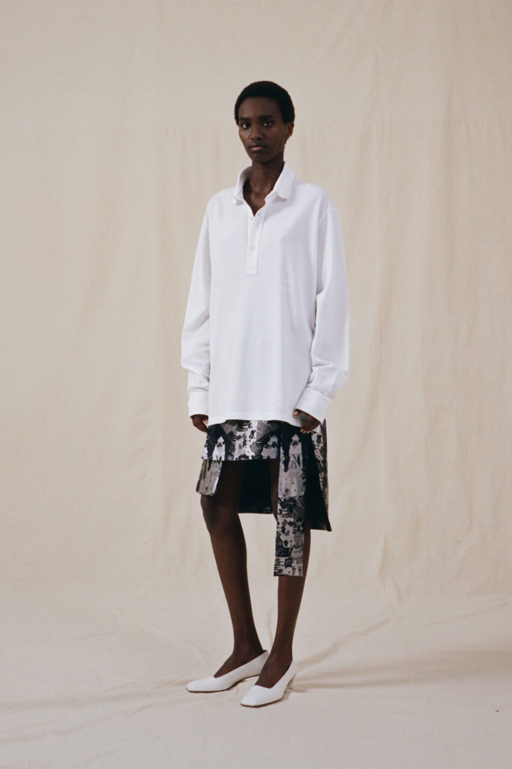 white relaxed shirt with asymmetric skirt