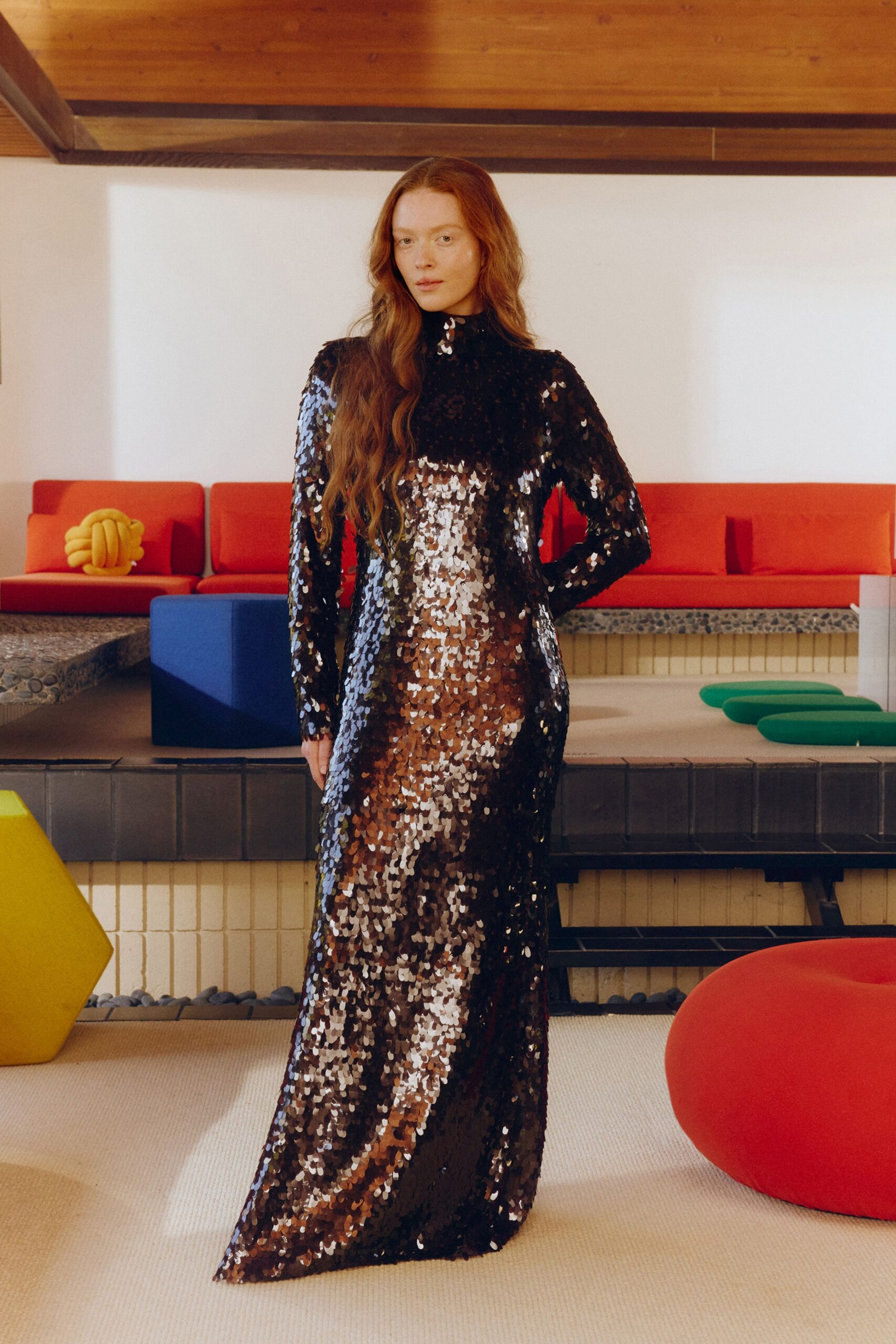black sequin long-sleeve gown