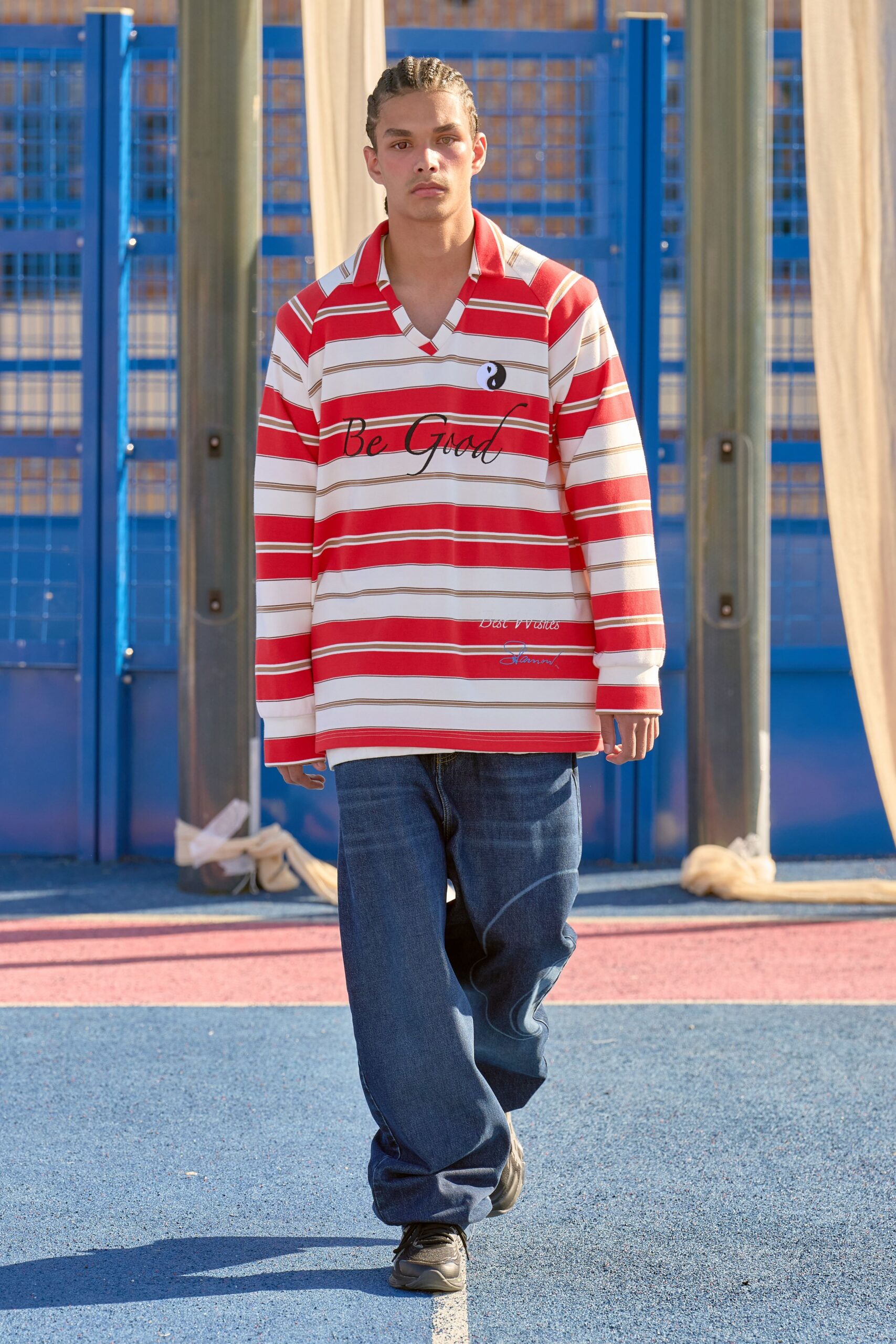 red and white striped shirt with blue jeans