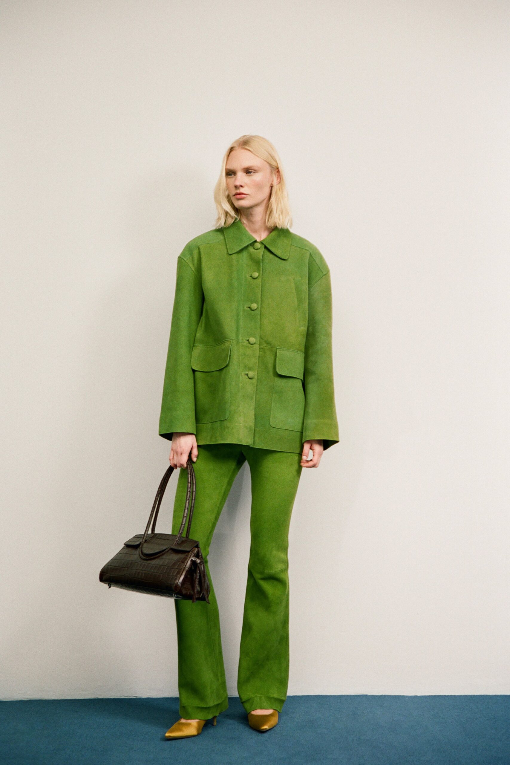 green suede long-sleeve collared relaxed buttoned pockets jacket