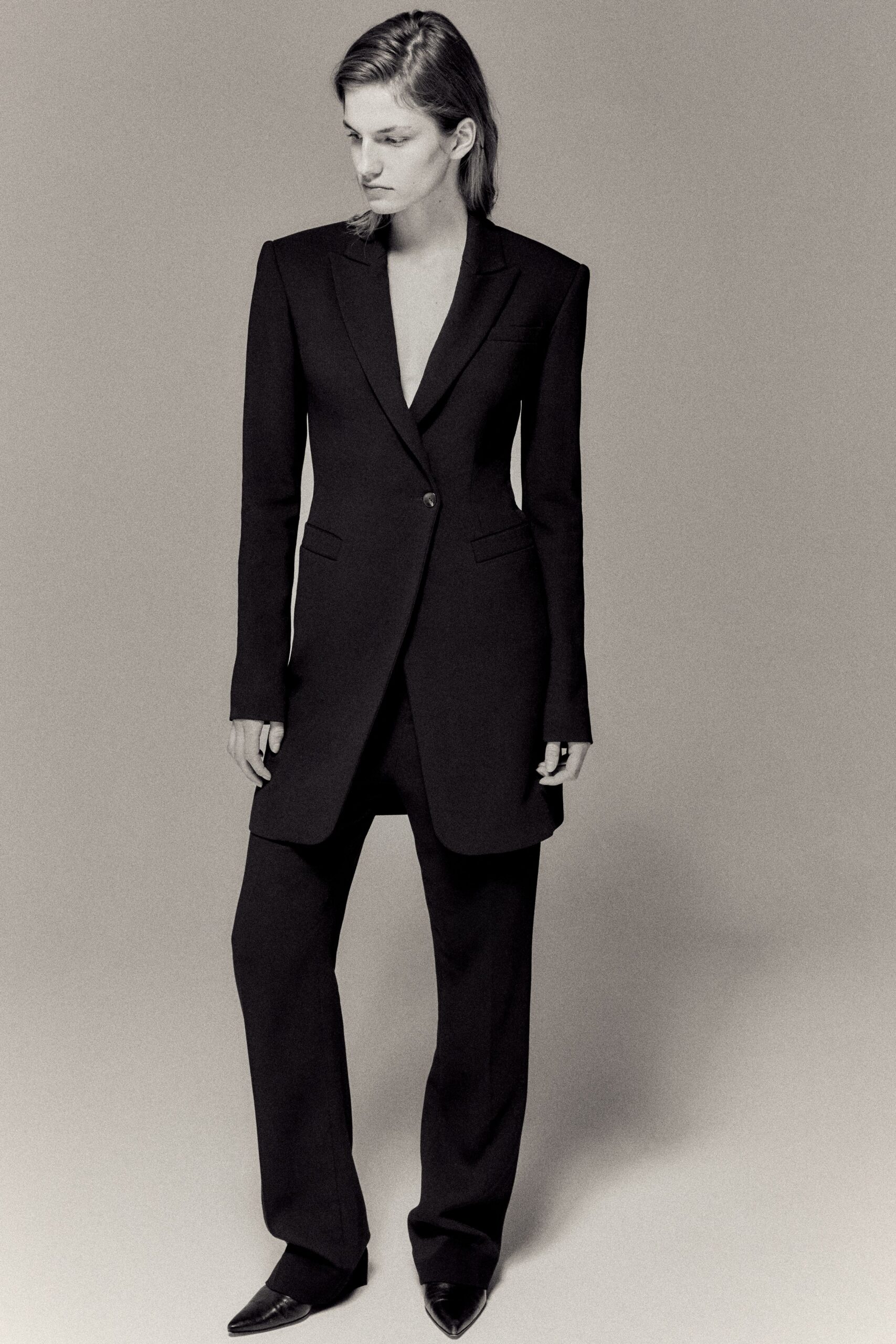 black long-sleeve v-neck tailored buttoned suit