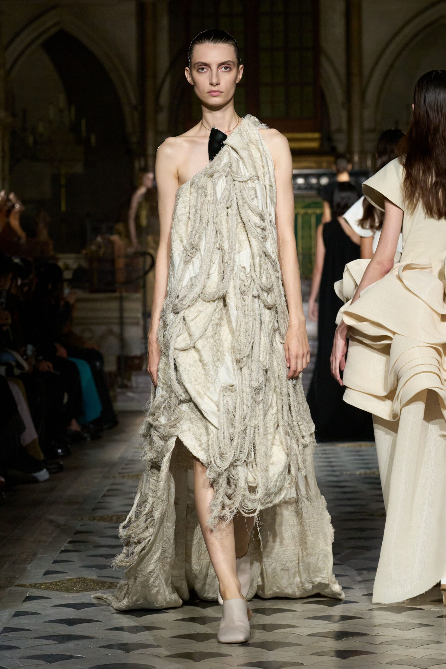 white draped asymmetric gown