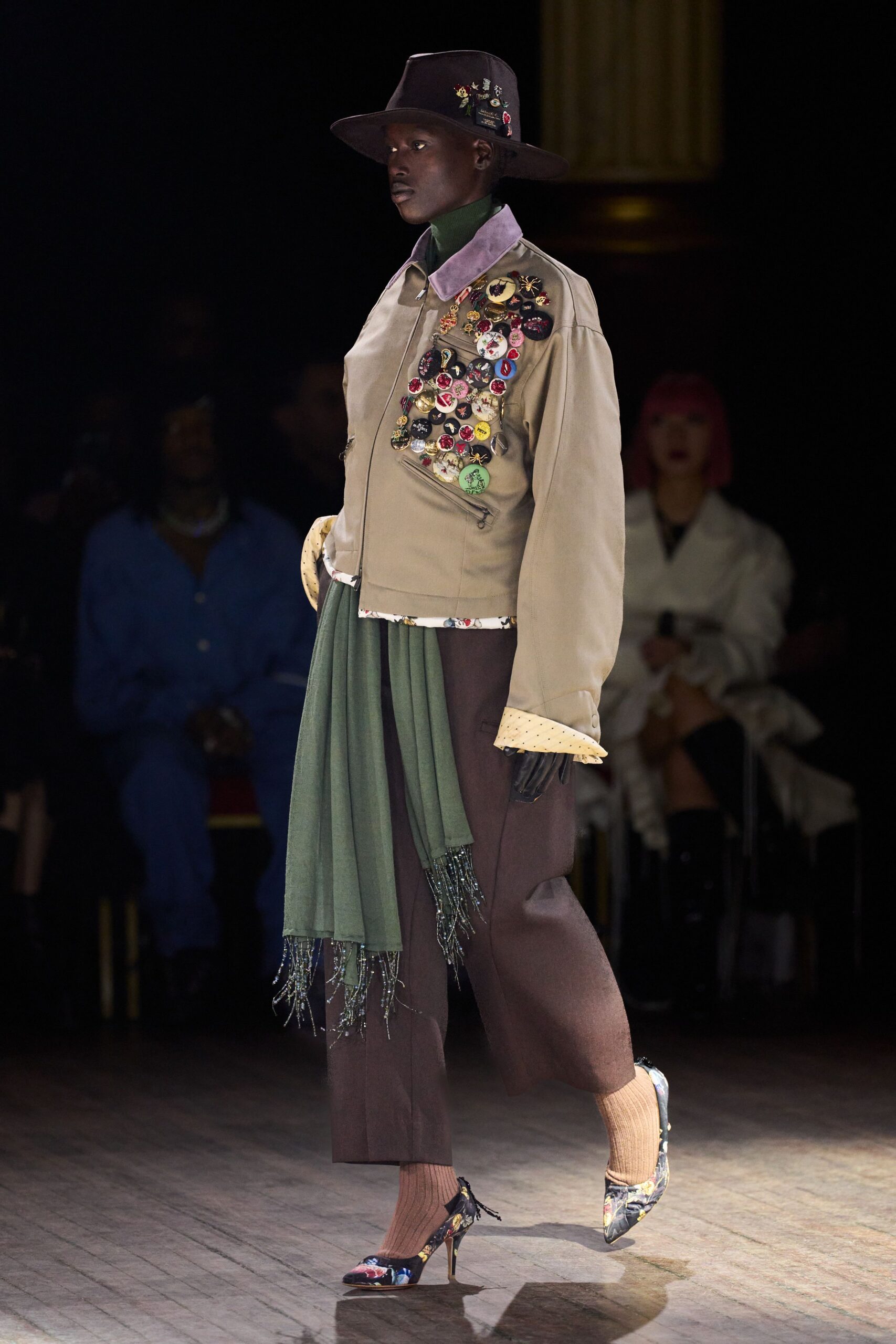 beige embroidered jacket with green top