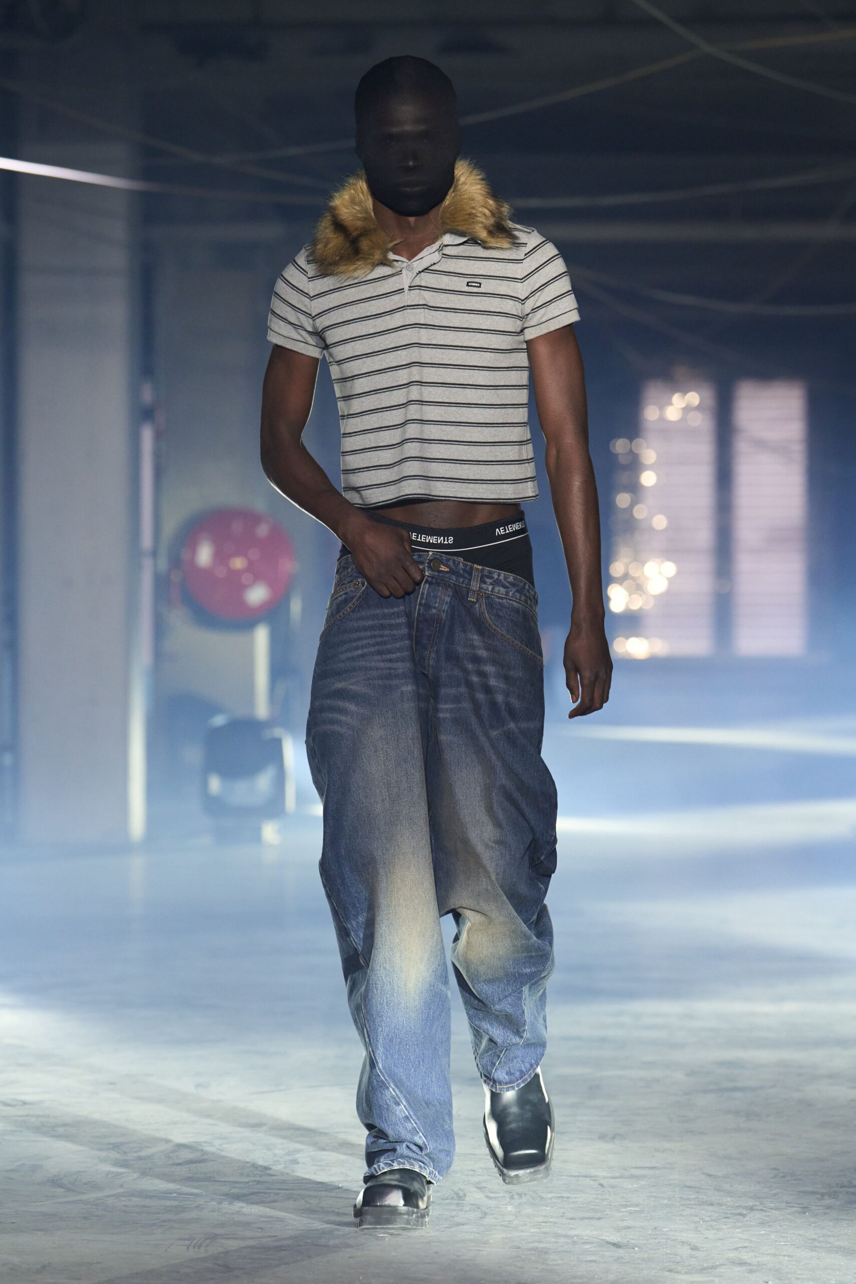 gray striped shirt with blue jeans