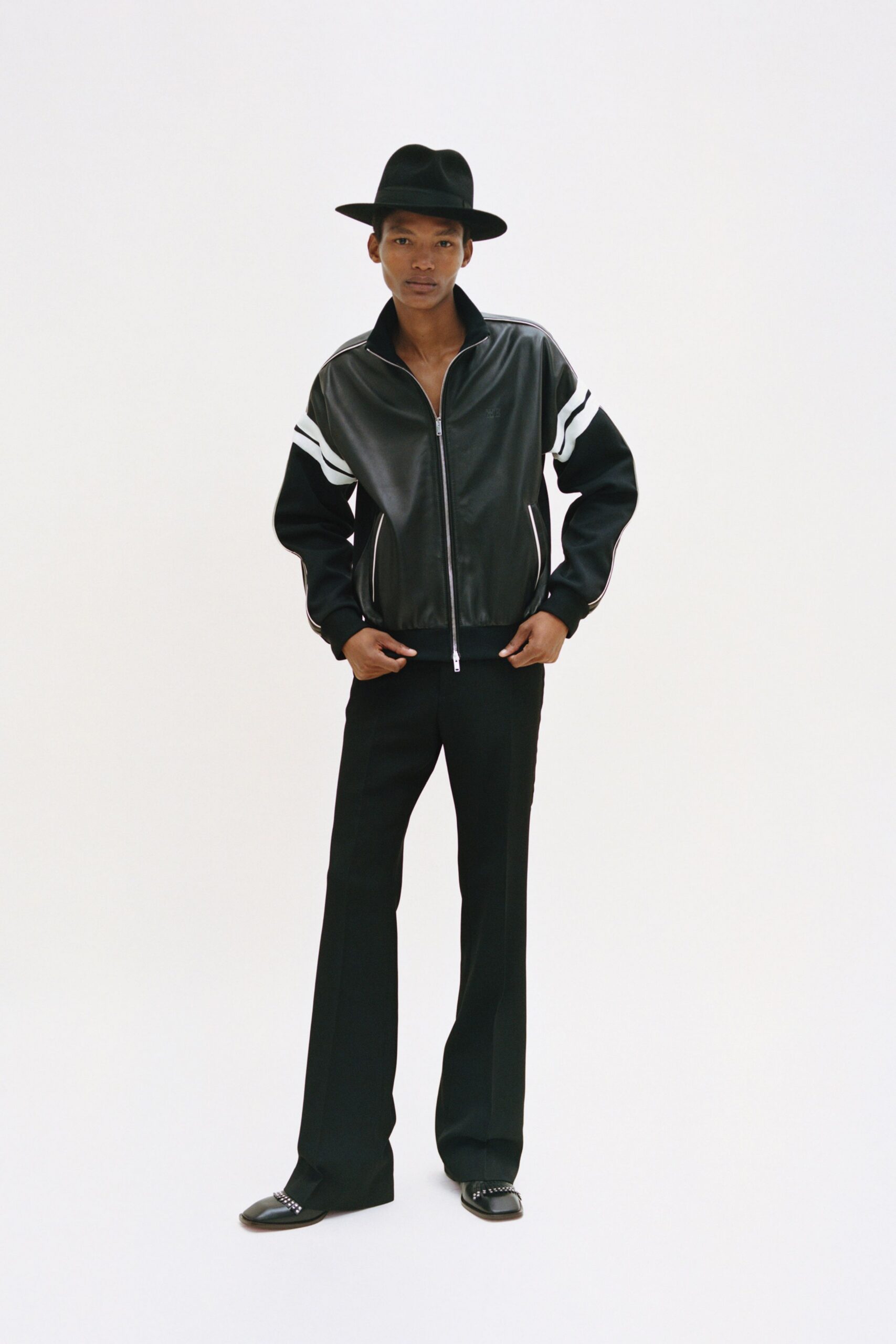 black leather jacket with flared pants